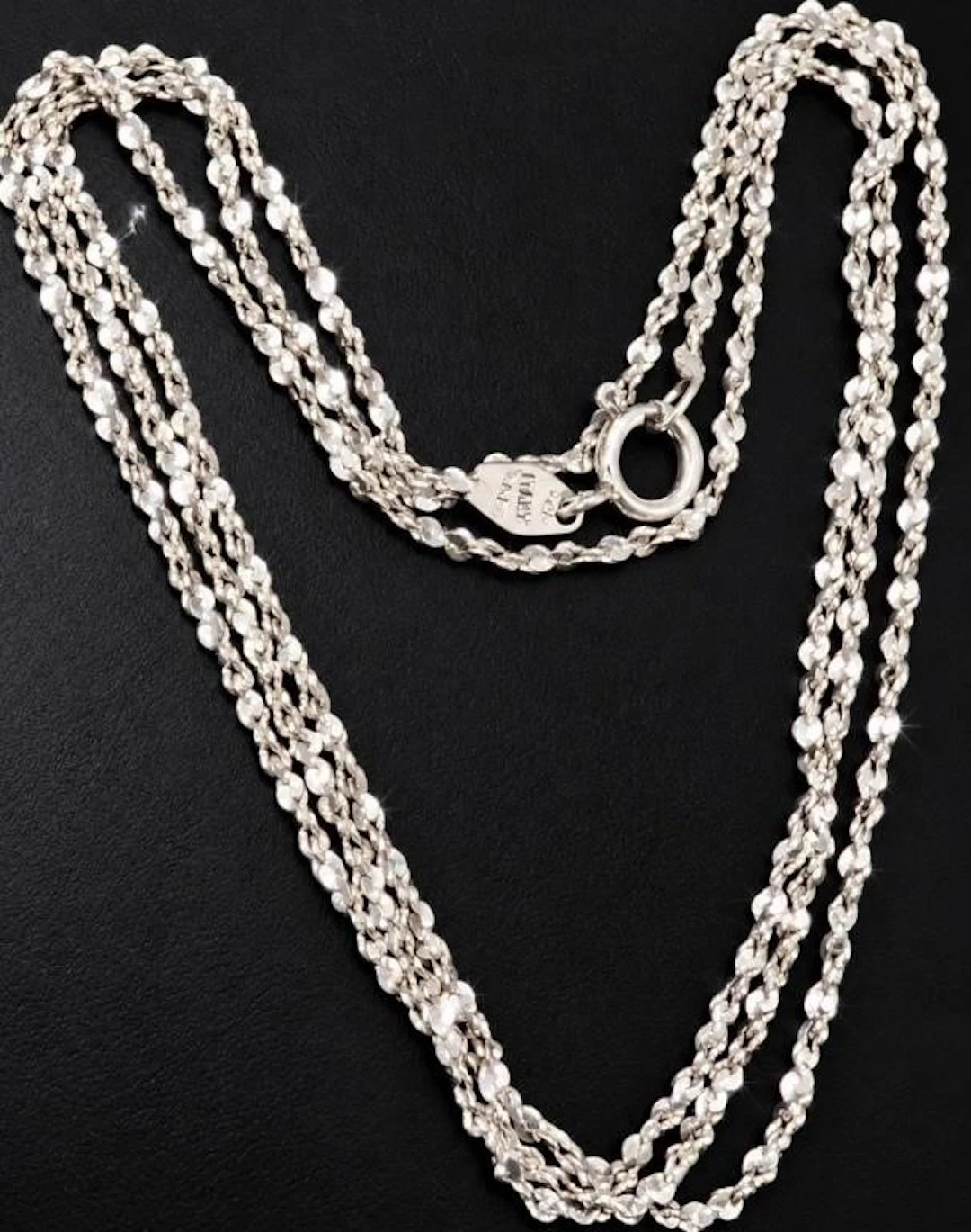 $60, silver(2g), chain 20", retail value $60