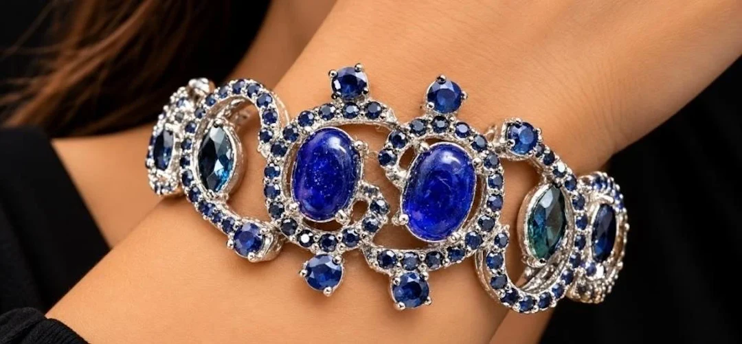 $2400, silver(30.7g), sapphire (12ct)bracelet 7"
