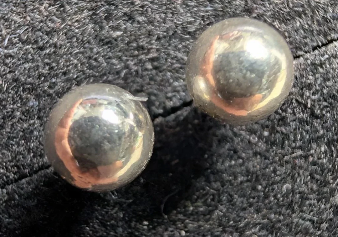 $50, silver(0.4g), earring, retail value $50
