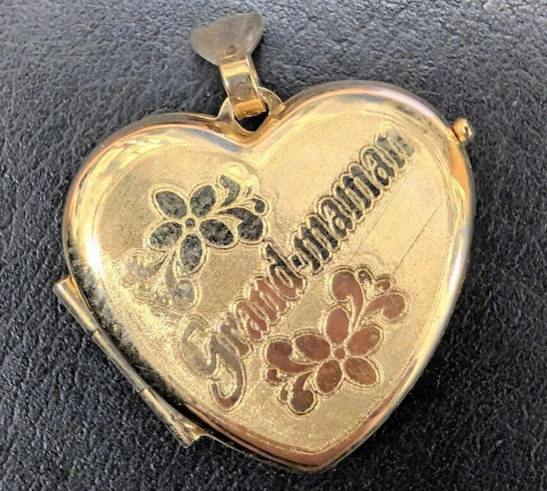 $1000, 10k(1.4g), pendant locket, retail value $1