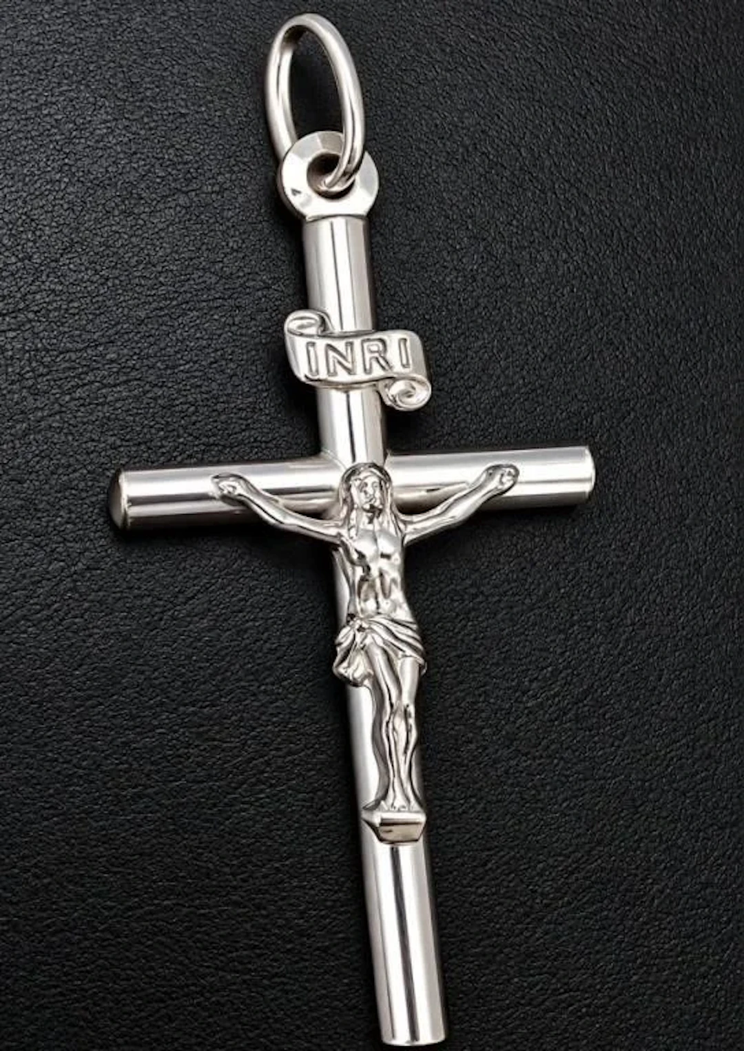 $60, silver(2.1g), cross pendant, retail value $6