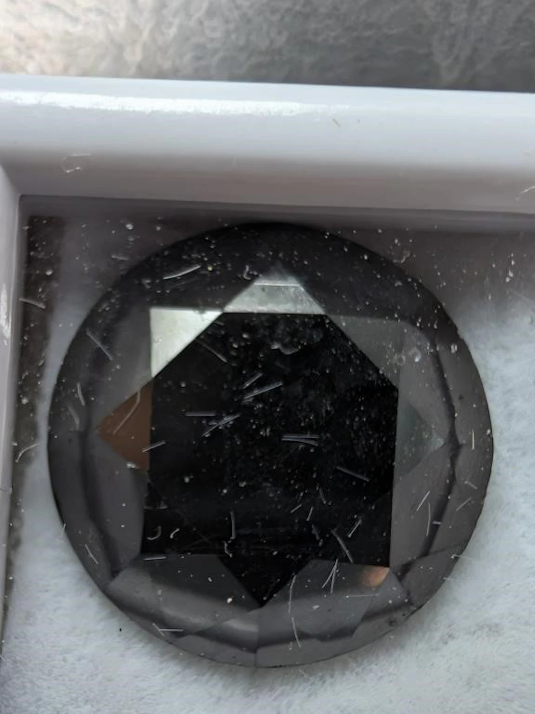 $2000, black diamond (5.4ct)gemstone, retail value