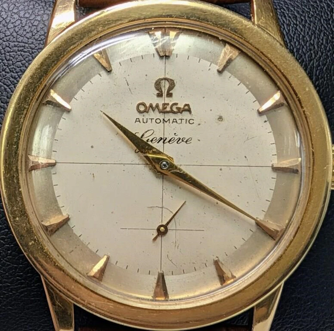$3500, Omega 18k (54.4g total weight with strap) 3