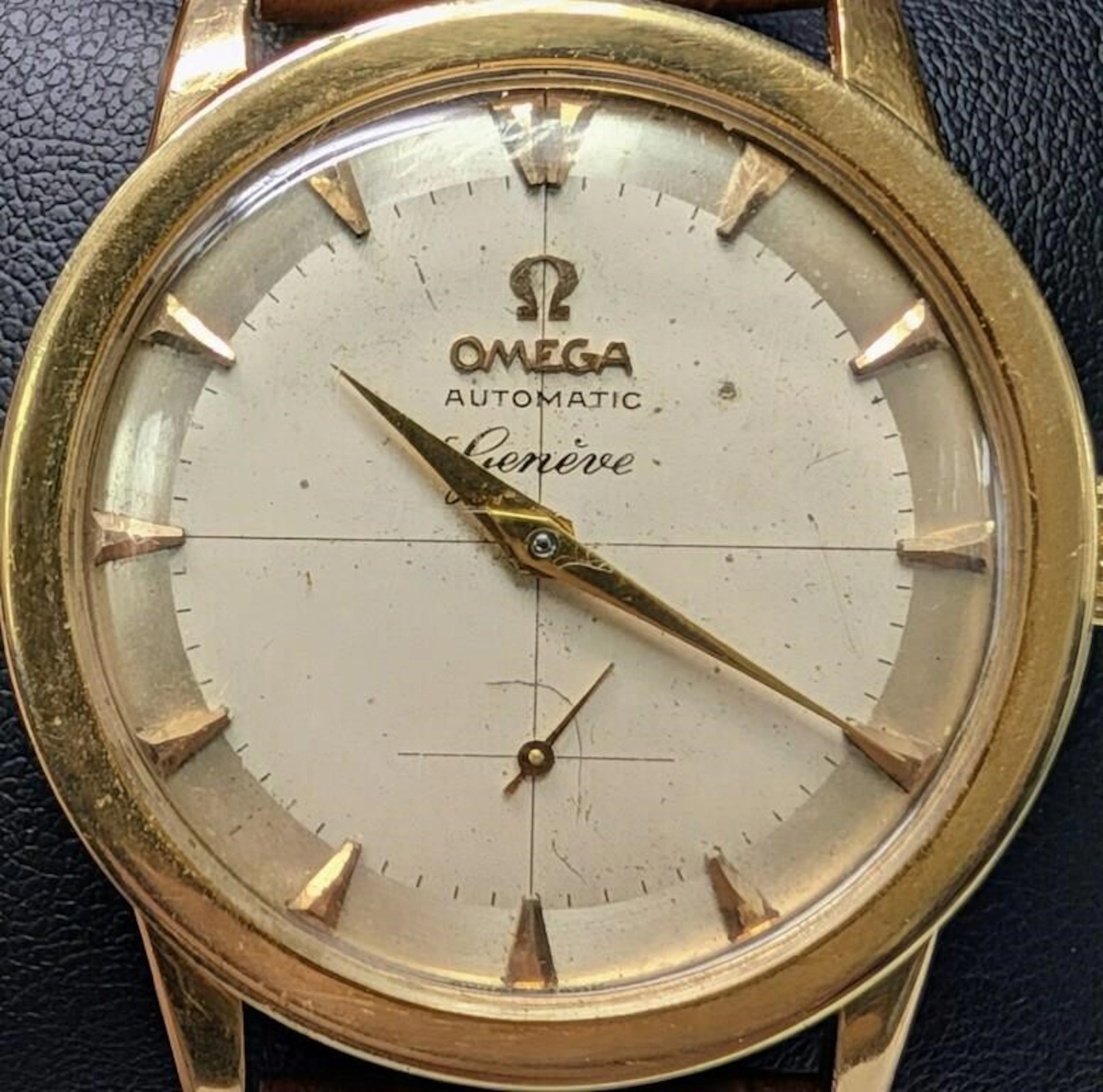 $3500, Omega 18k (54.4g total weight with strap) 3