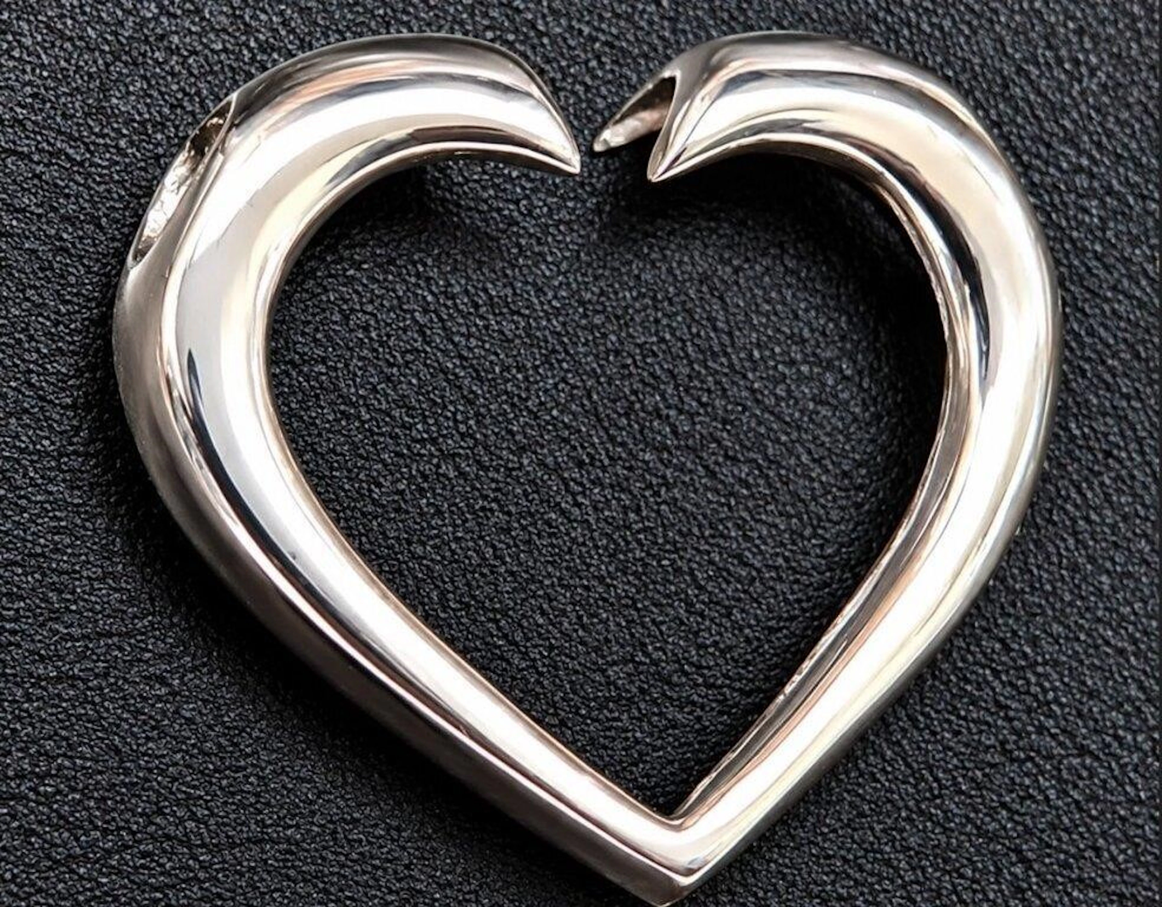 $40, silver heart shape pendant, retail value $40