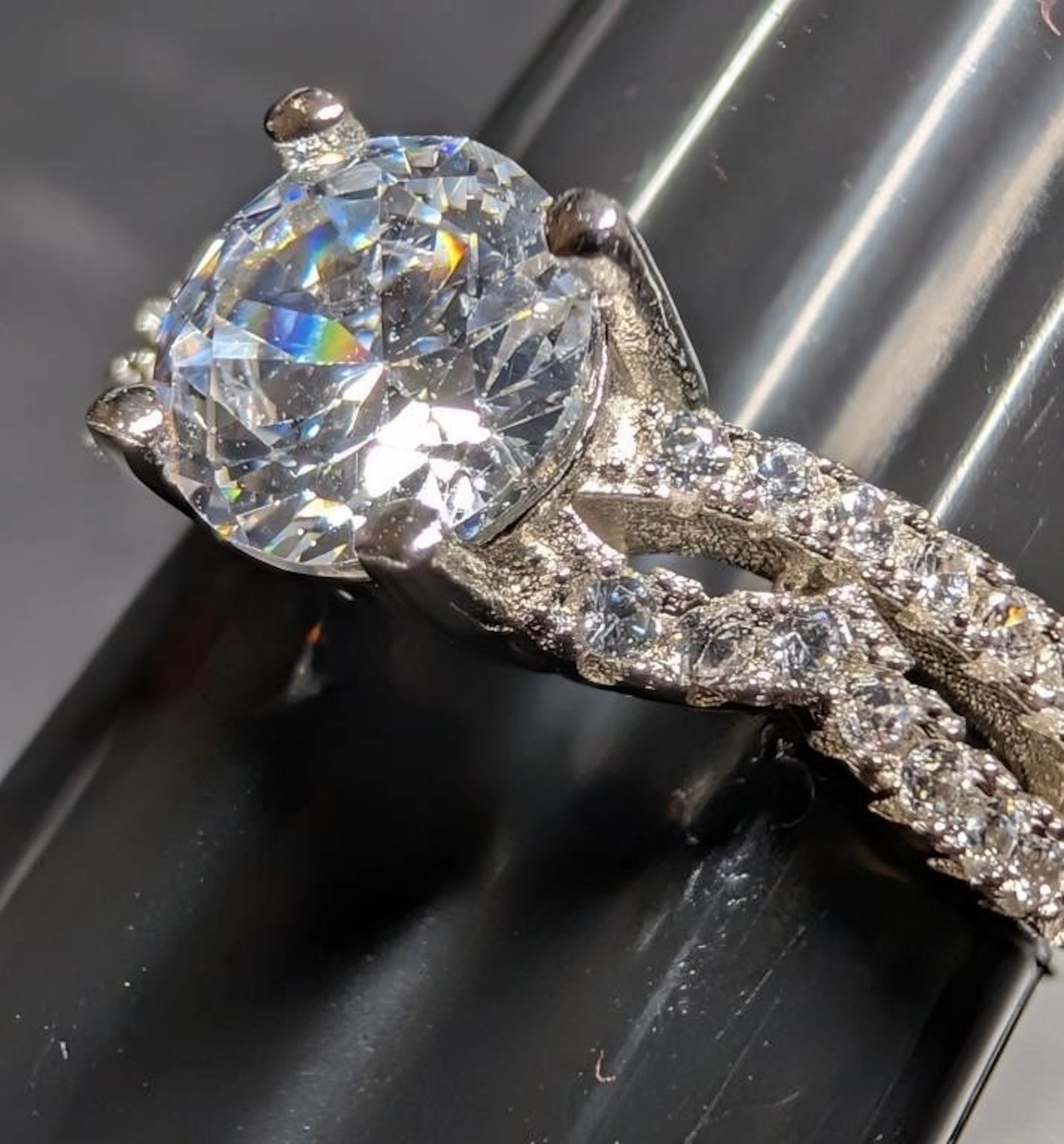 $100, silver(2.92g), cz ring, size , retail value