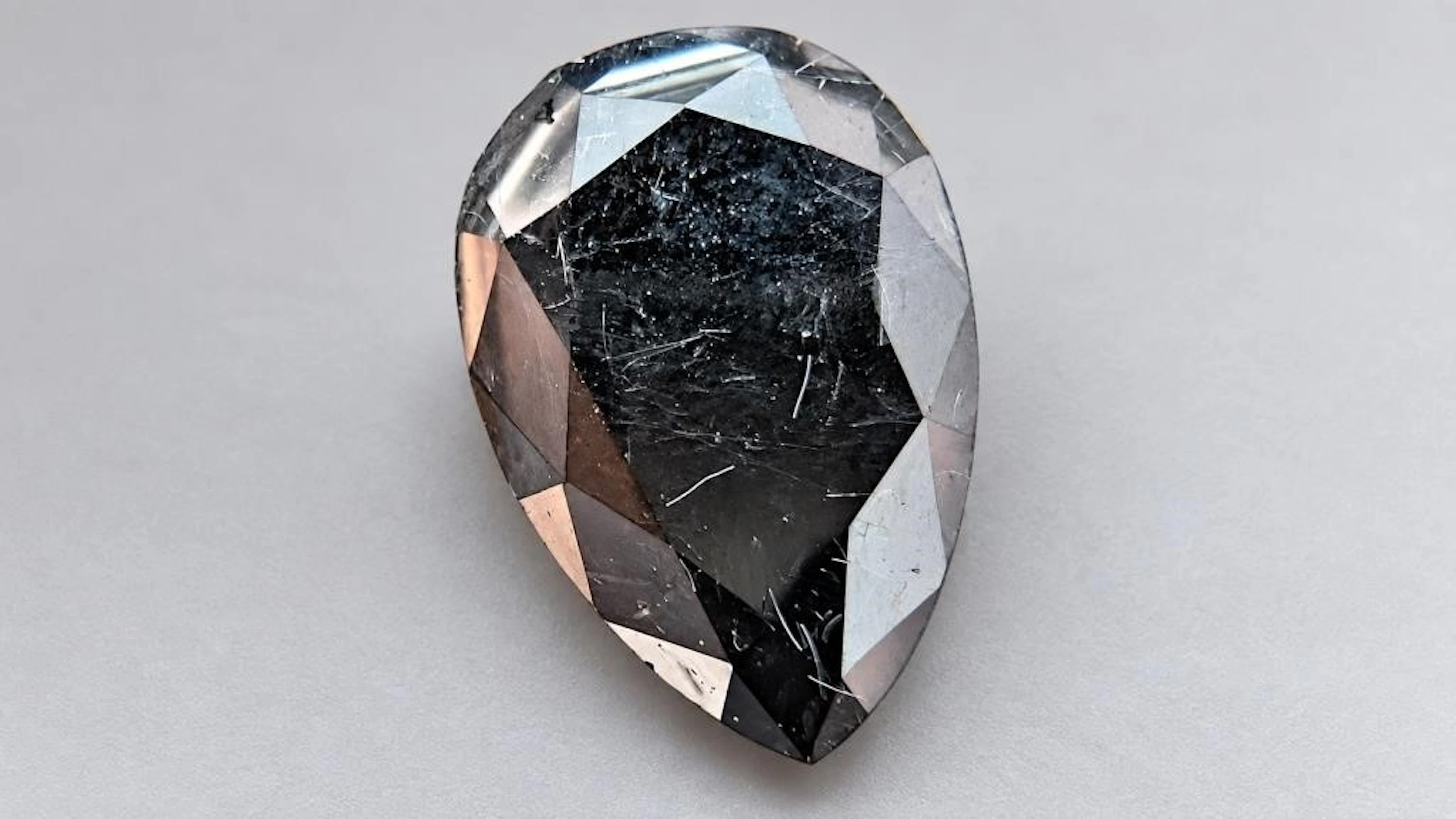 $1400, black diamond (2.68ct)gemstone, retail valu