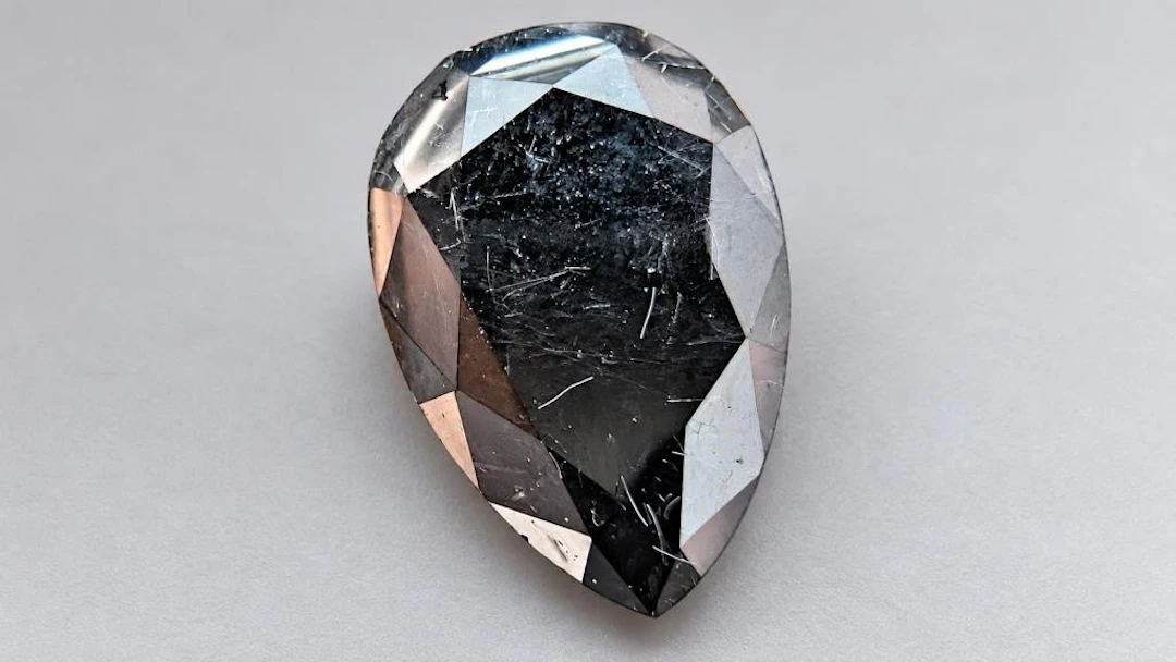$1400, black diamond (2.68ct)gemstone, retail valu
