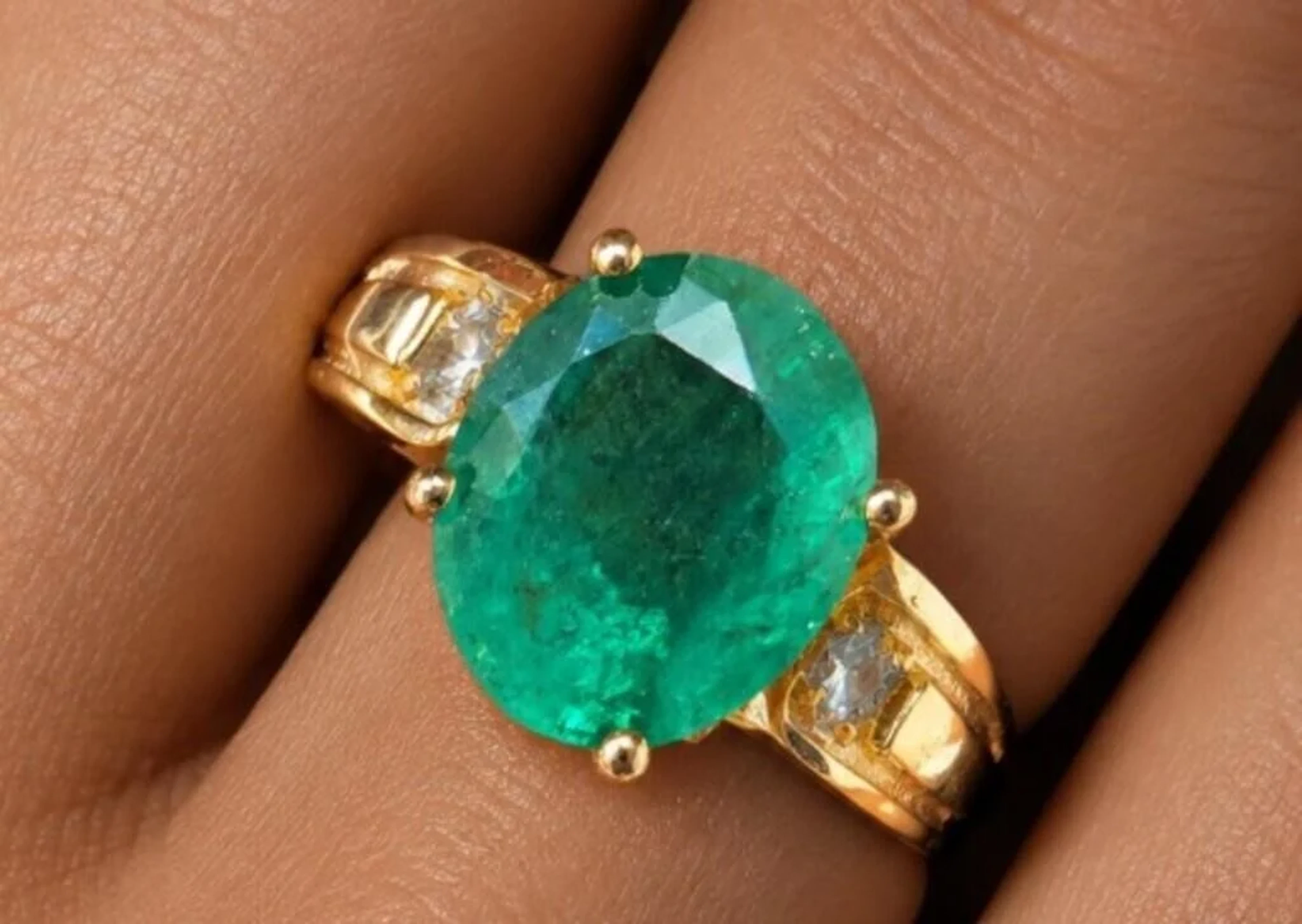 $2520, 14k(2.71g), emerald (1ct), diamond (0.04ct)