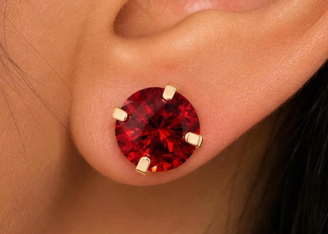 $600, 14k garnet (1.96ct)earring, retail value $60