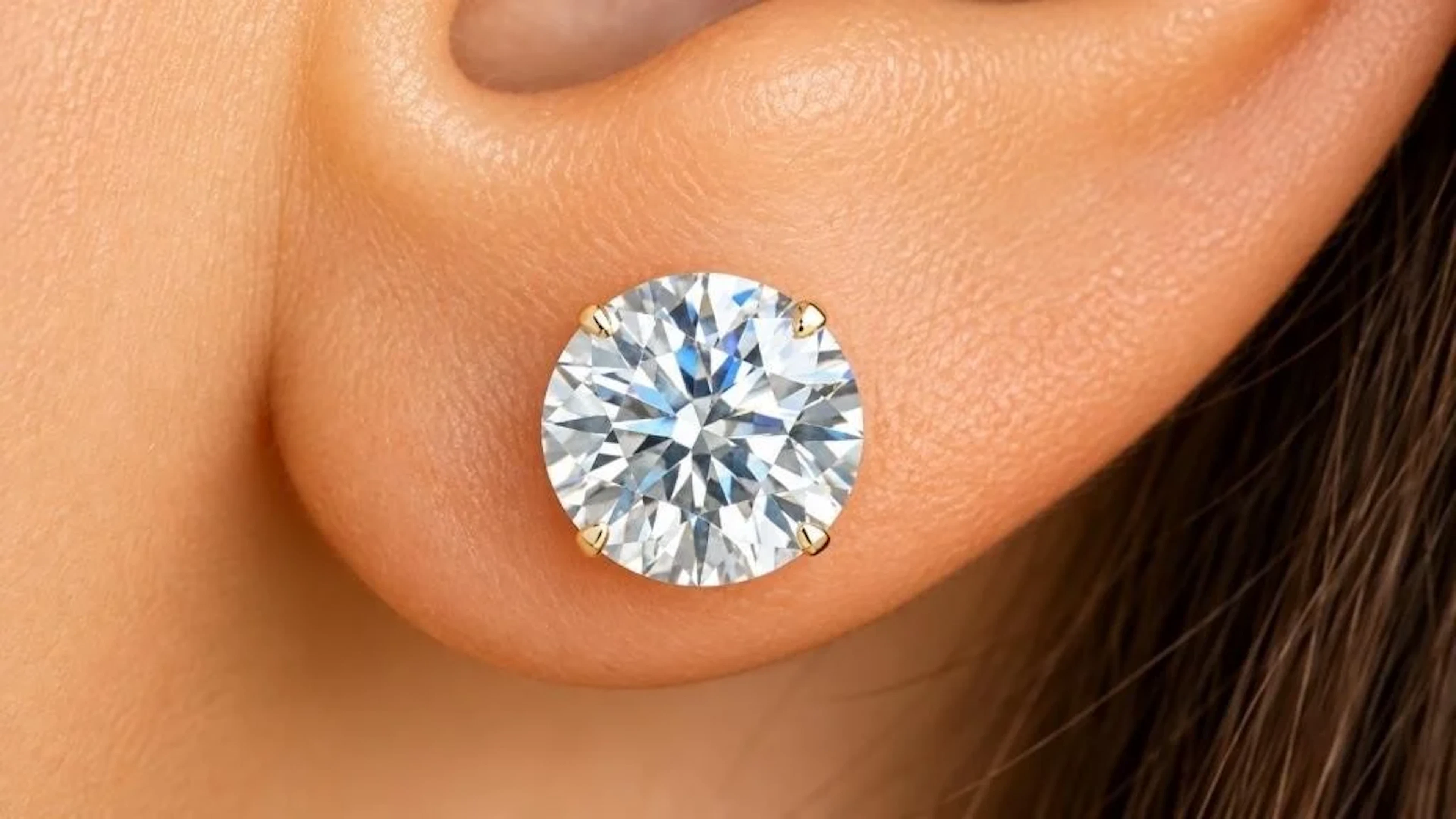 $1800, 14k lab diamond (1ct) earring, retail valu