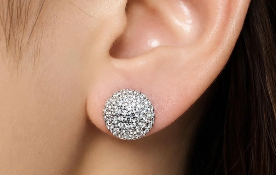 $1200, 10k(1.69g), cz earring, retail value $1200