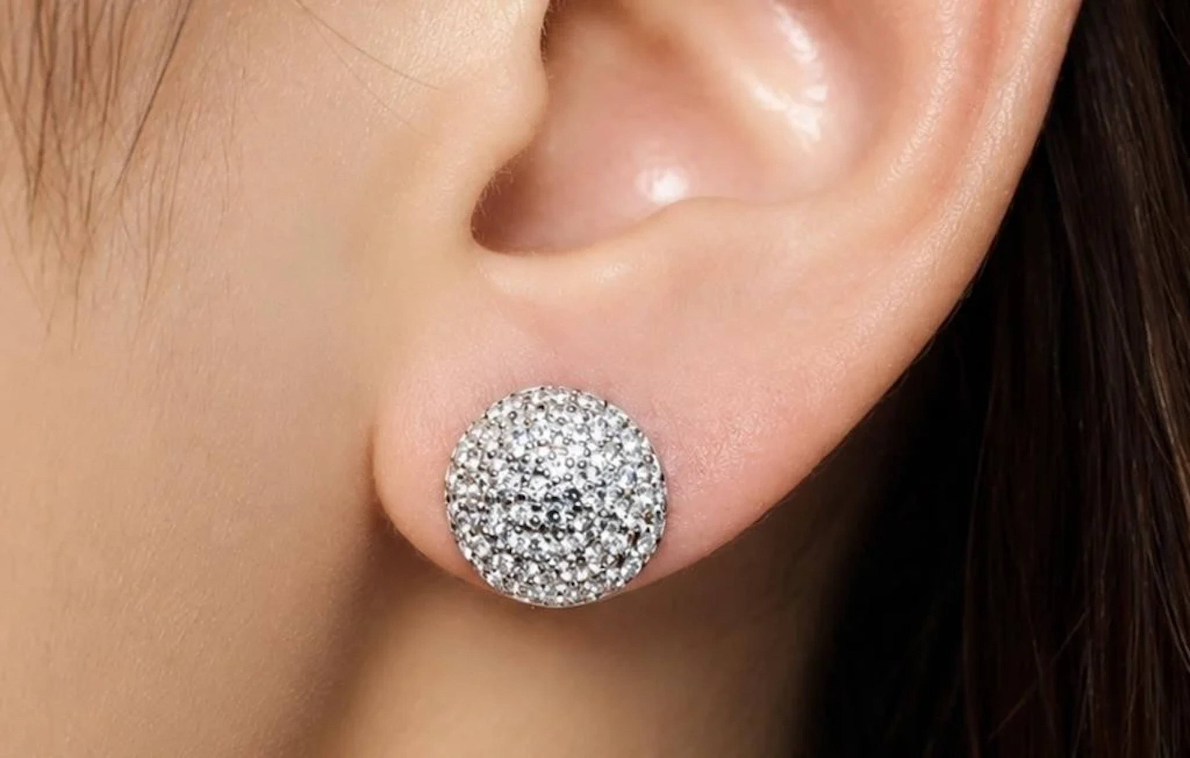 $1200, 10k(1.69g), cz earring, retail value $1200