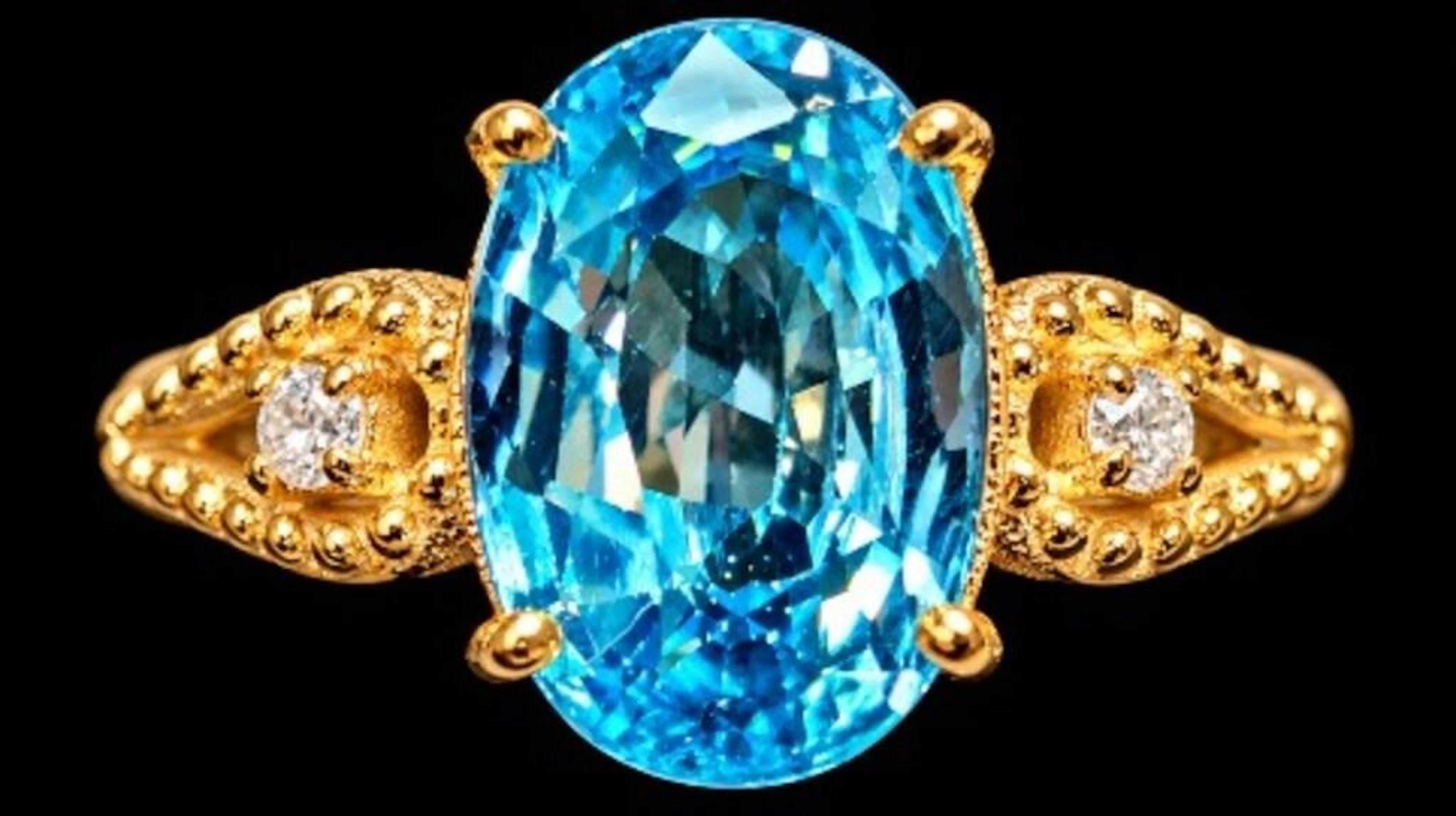 $3600, 10k(2.6g), blue zircon (4.3ct), diamond (0.