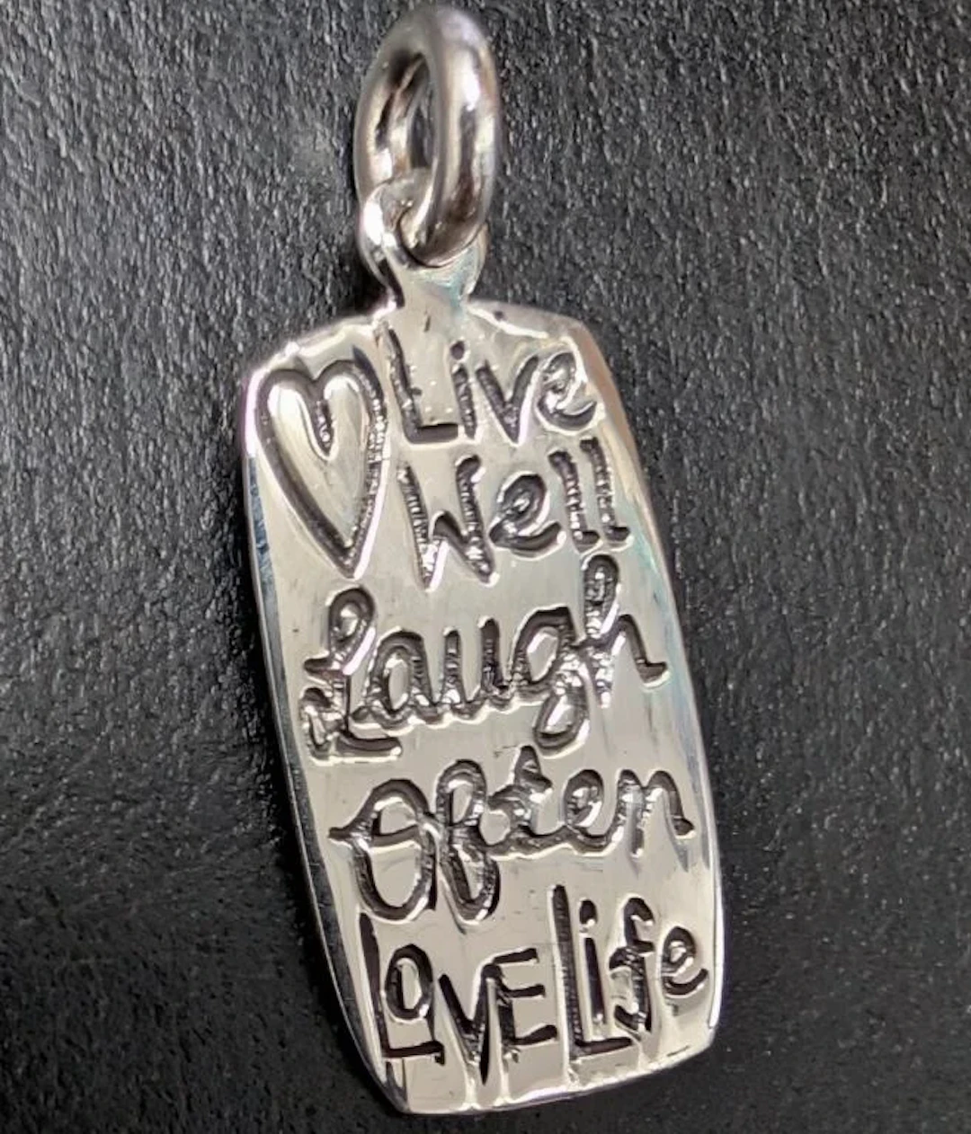 $40, silver pendant, retail value $40