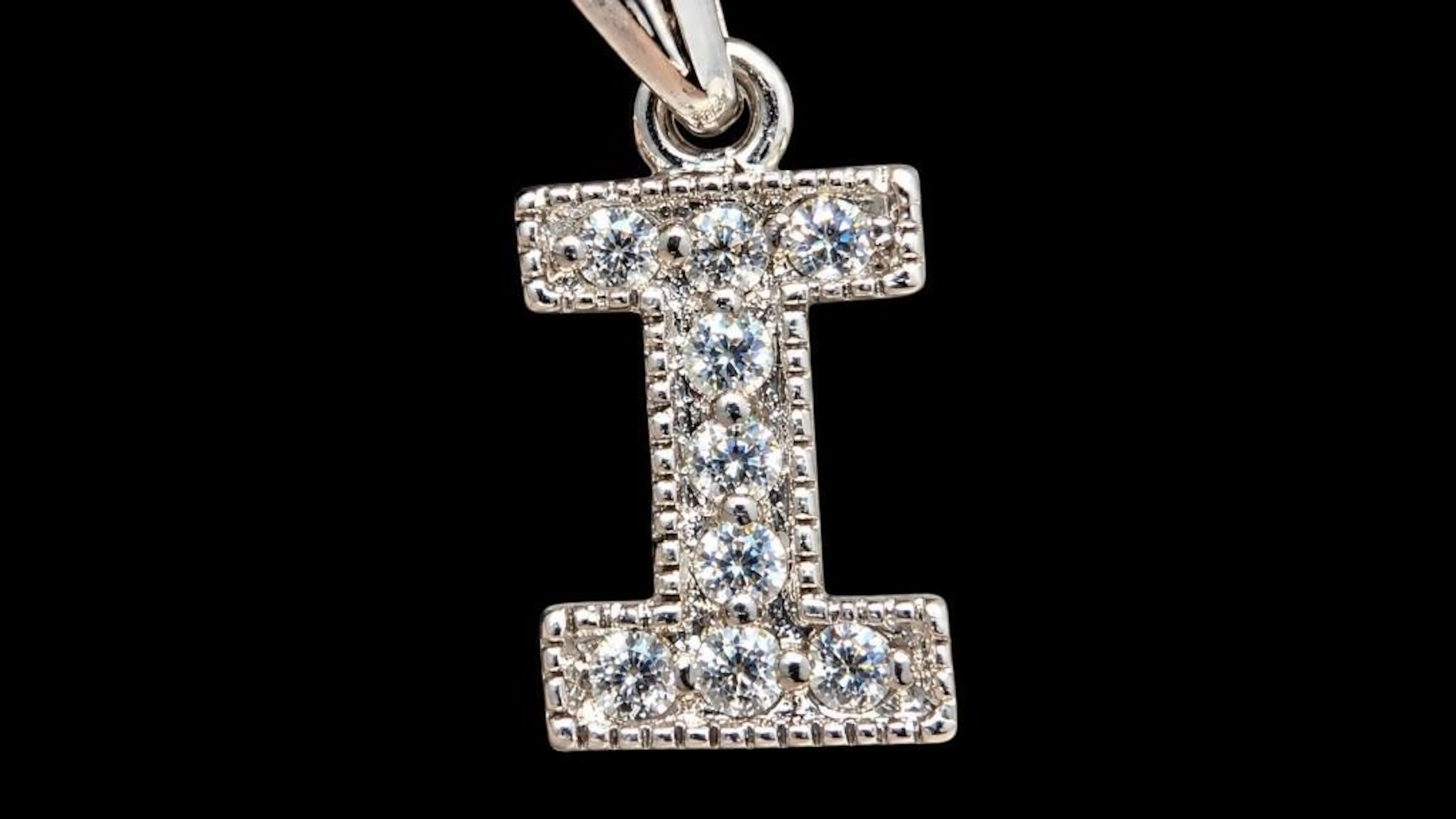 $40, silver(1.4g), CZpendant, retail value $40