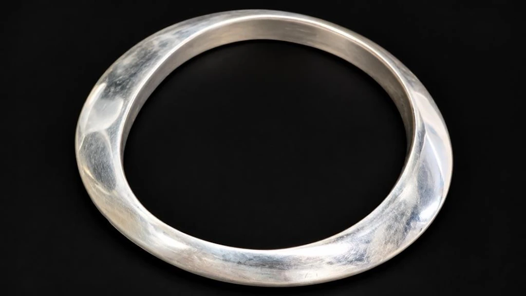 $1100, silver(36.8g), bangle, retail value $1100