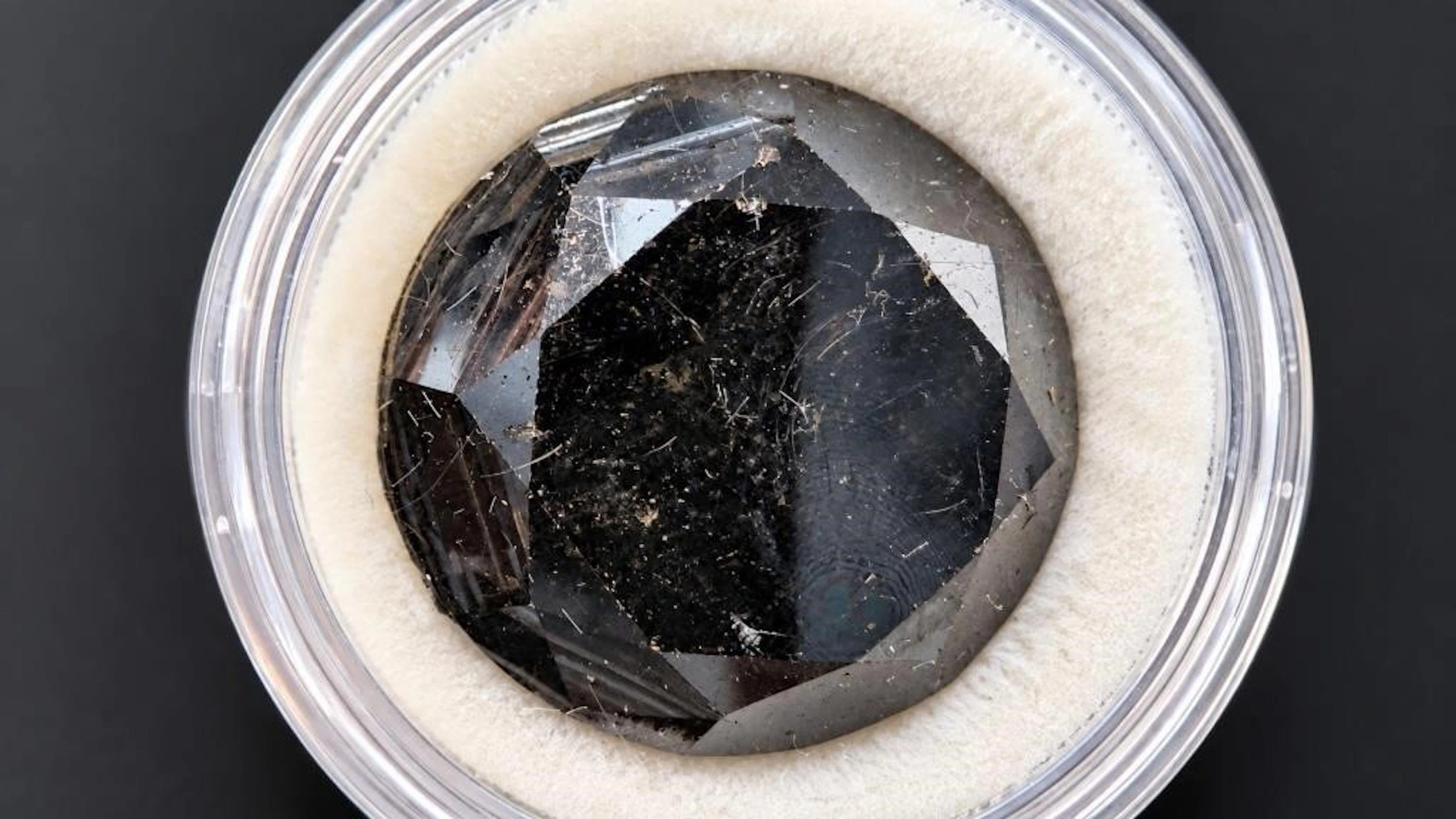 $11200, Treated large size black diamond (22.5ct)g