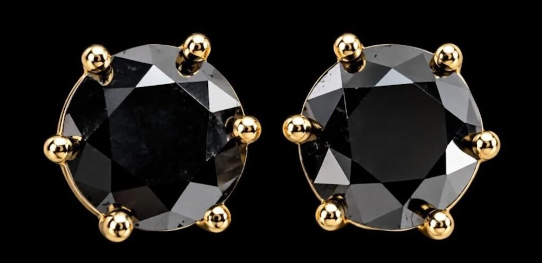 $1000, 14kblack diamond (0.65ct)earring, retail va