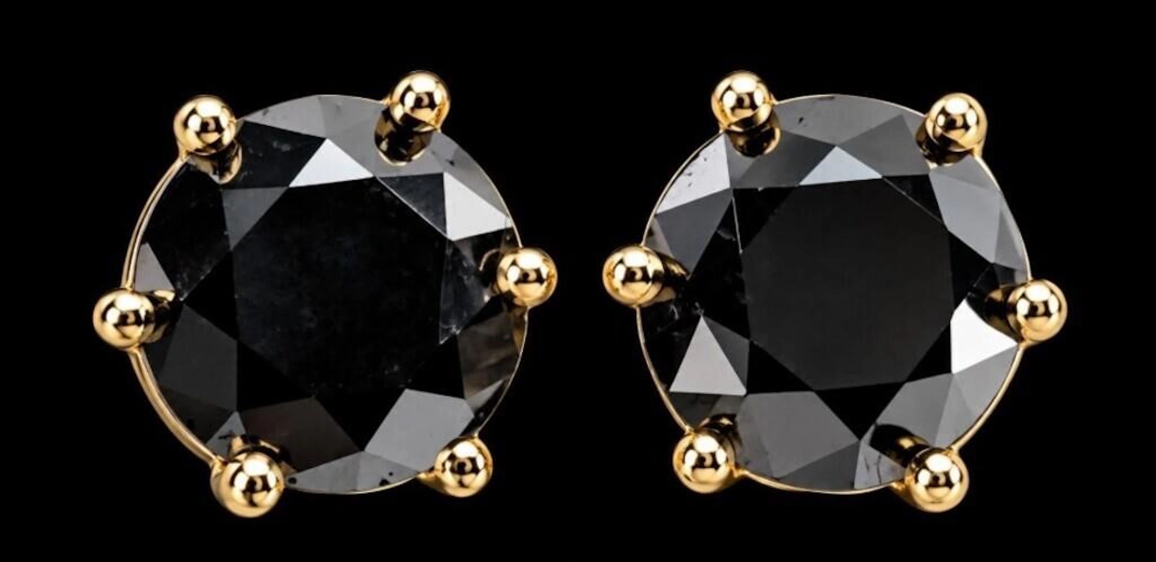 $1000, 14kblack diamond (0.65ct)earring, retail va
