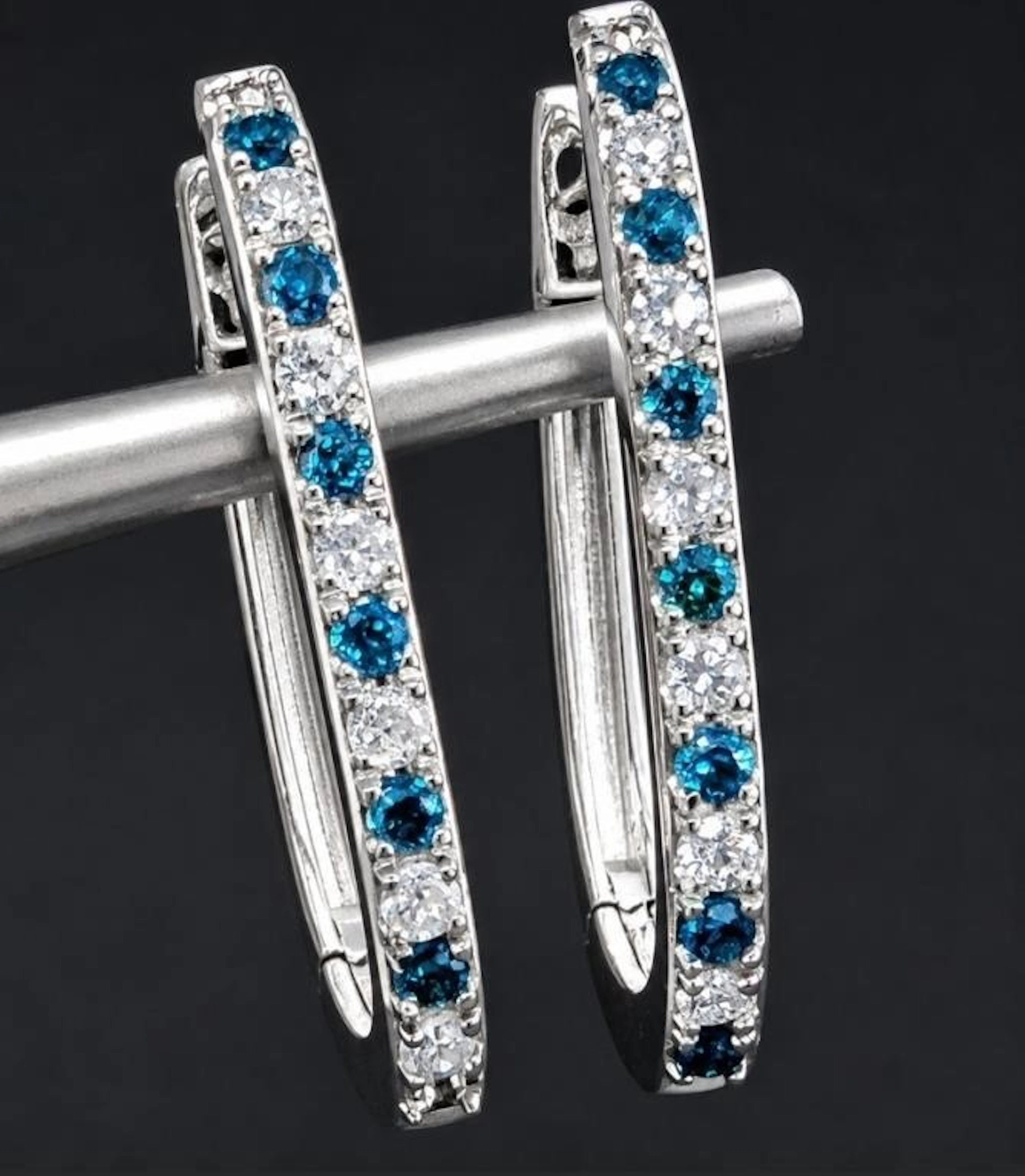 $1855, 14k(1.75g), natural diamond (0.15ct)earring
