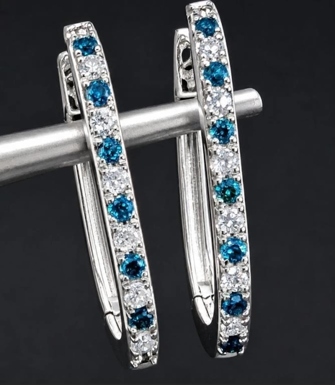 $1855, 14k(1.75g), natural diamond (0.15ct)earring