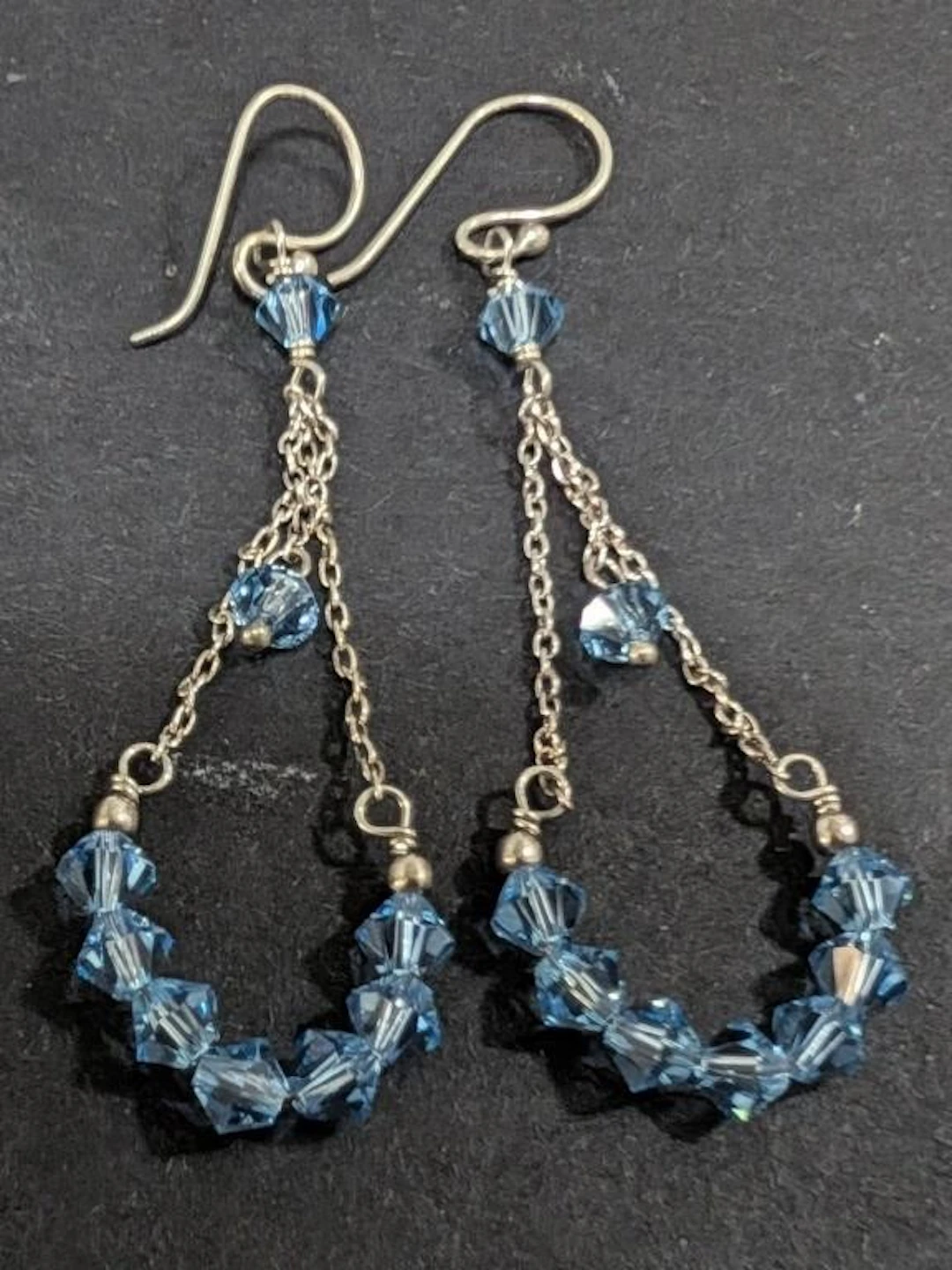 $40, earring, appraised/retail value $40