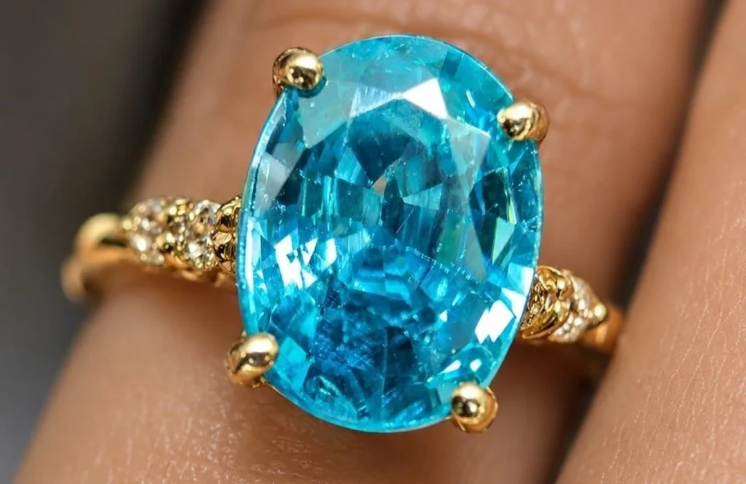 $2600, 10k(1.8g), blue zircon (1.8ct), dia (0.06c