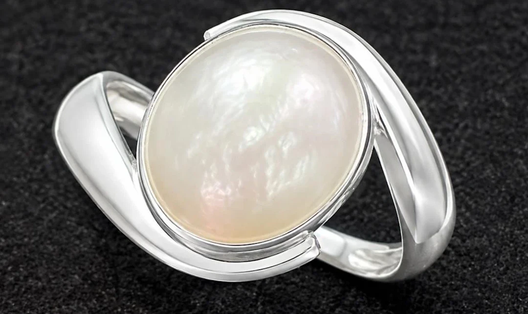 $160, silver(2.7g), mabe pearl ring, retail value