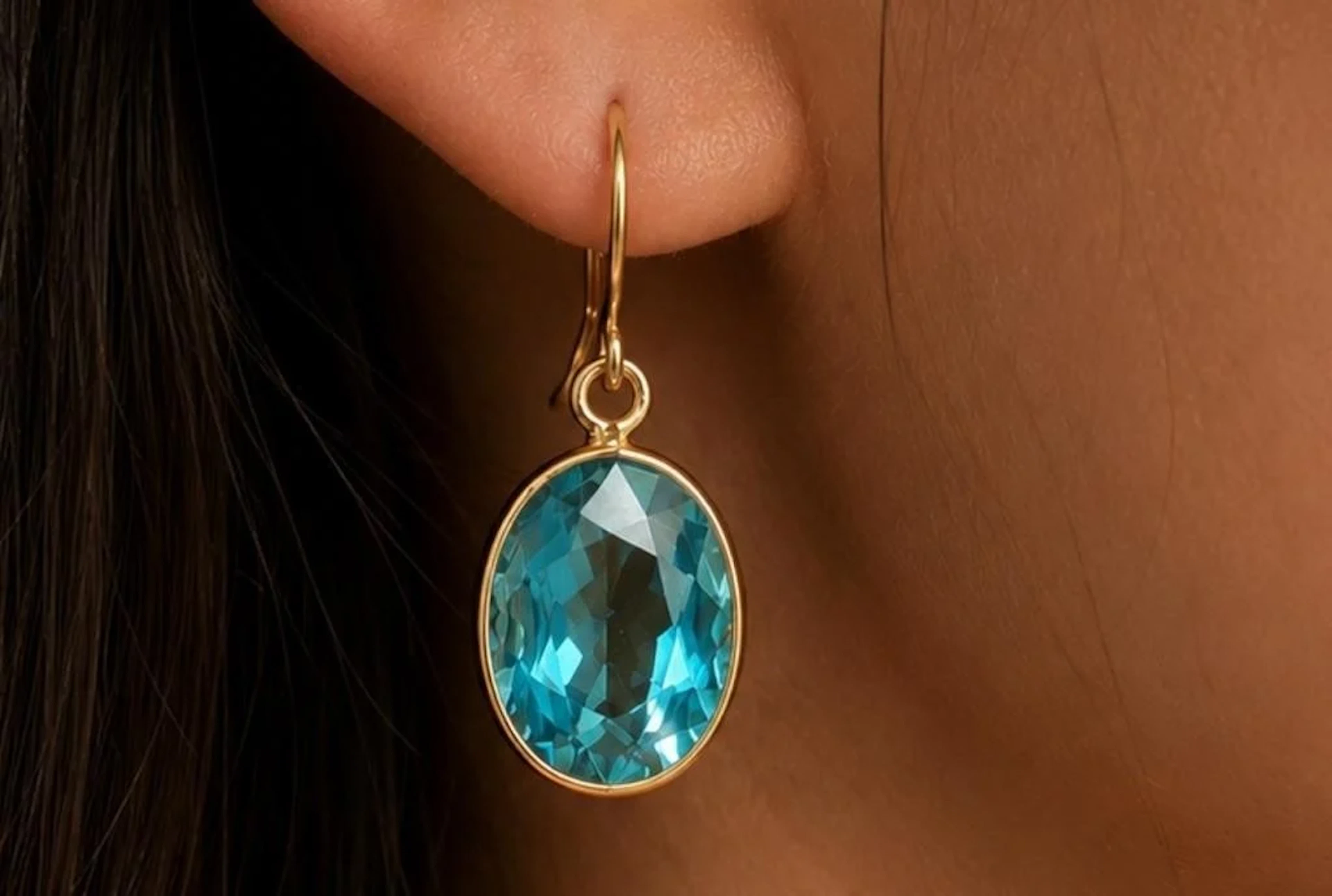 $1400, 10k(1.4g), blue zircon (5.2ct) earring, re