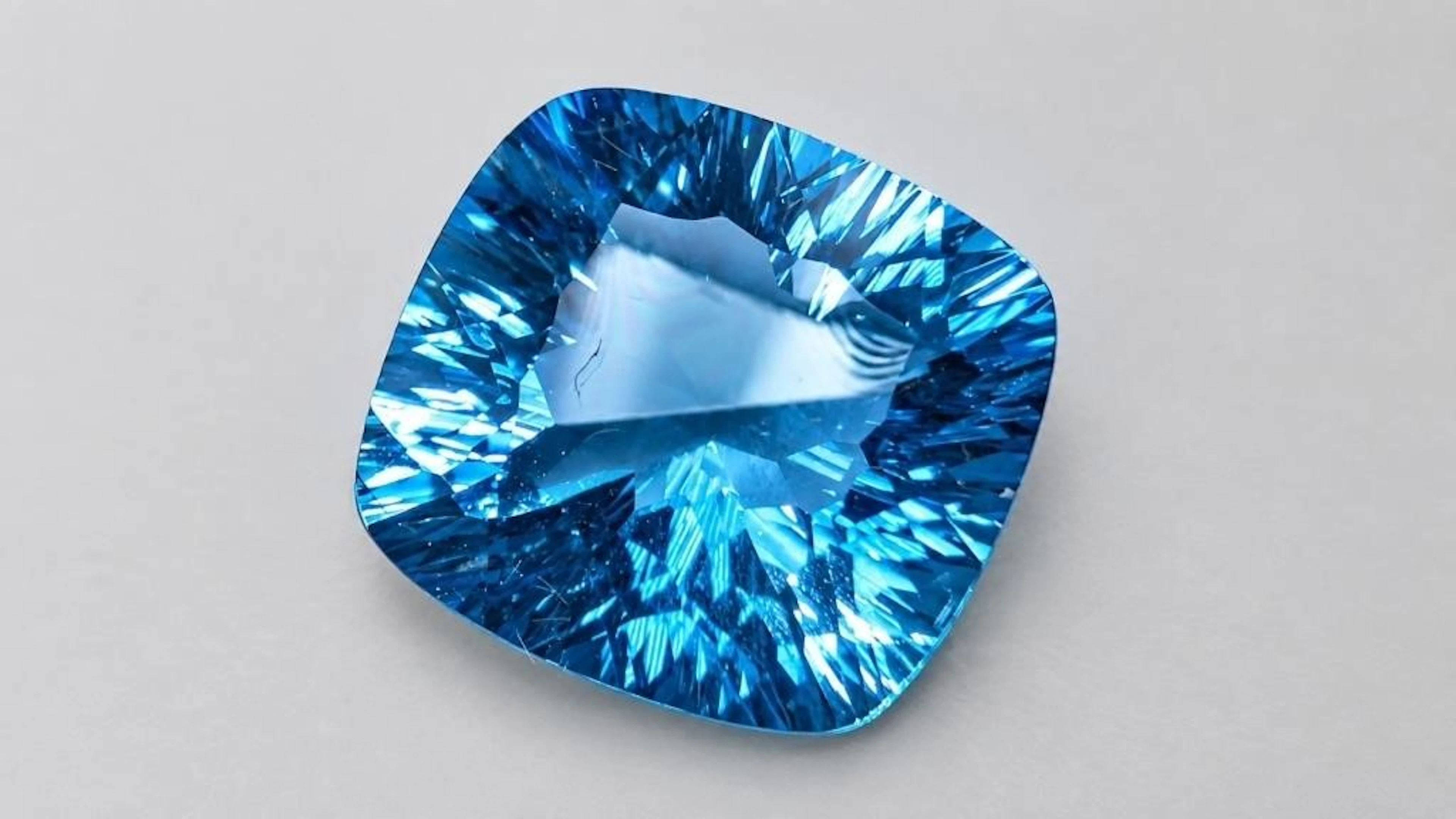 $800, Blue topaz (10.5ct)gemstone, retail value $8