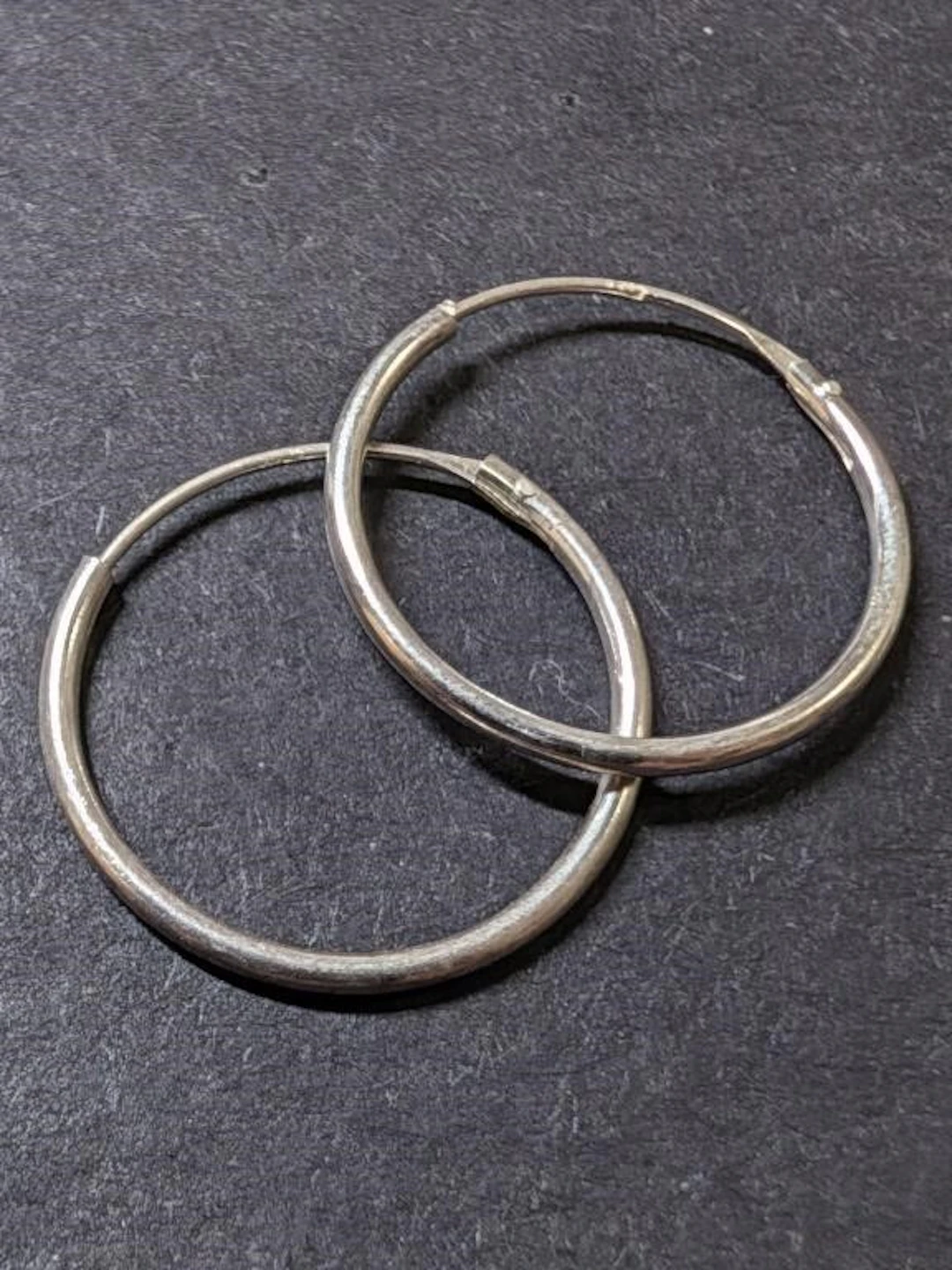 $20, SilverhoopEarring, appraised/retail value $20