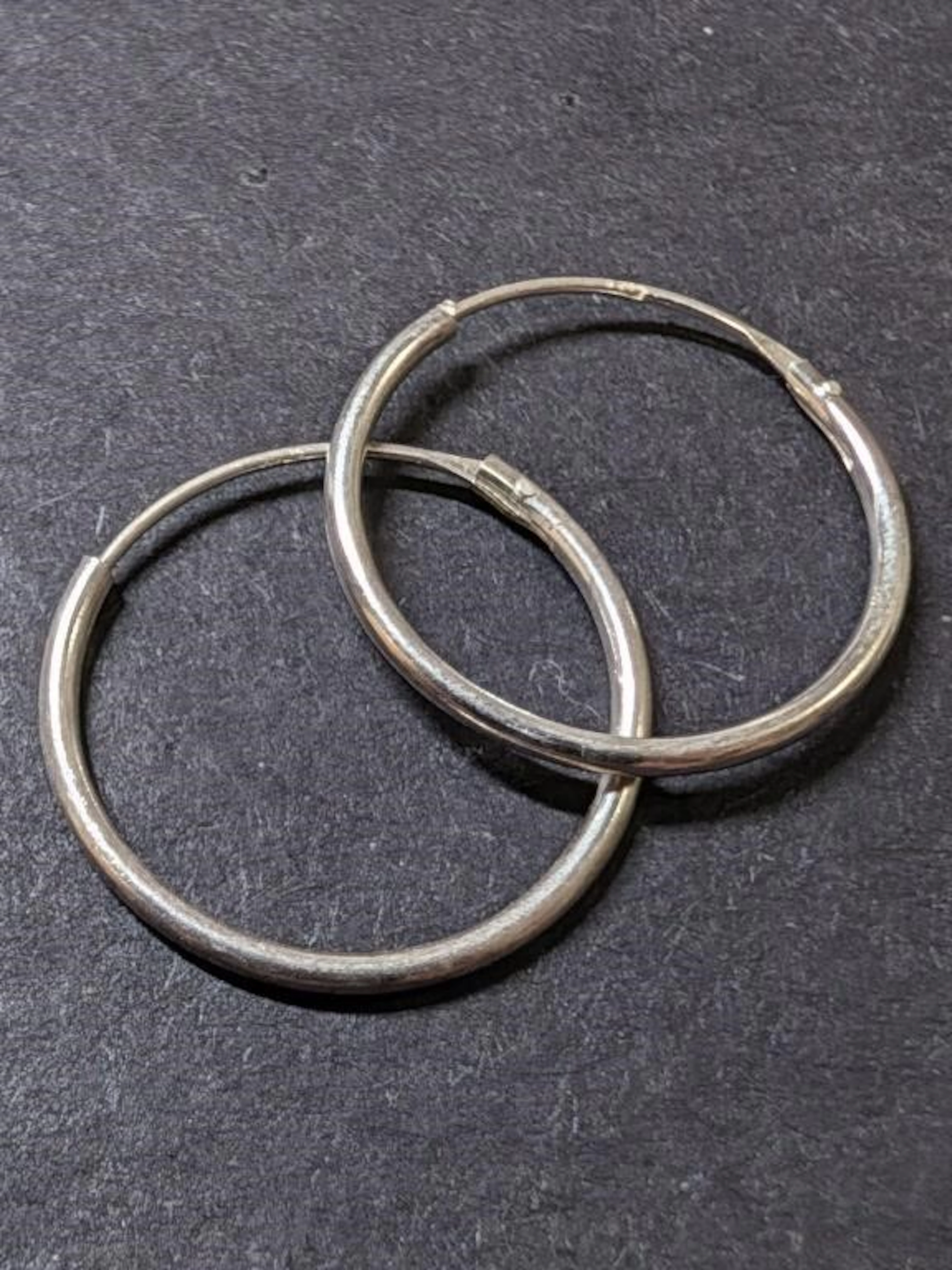 $20, SilverhoopEarring, appraised/retail value $20