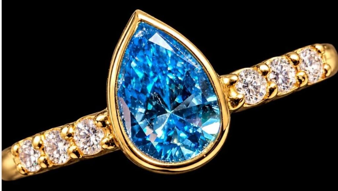 $2000, 10k(1.4g), lab diamond (0.38ct), diamond (0