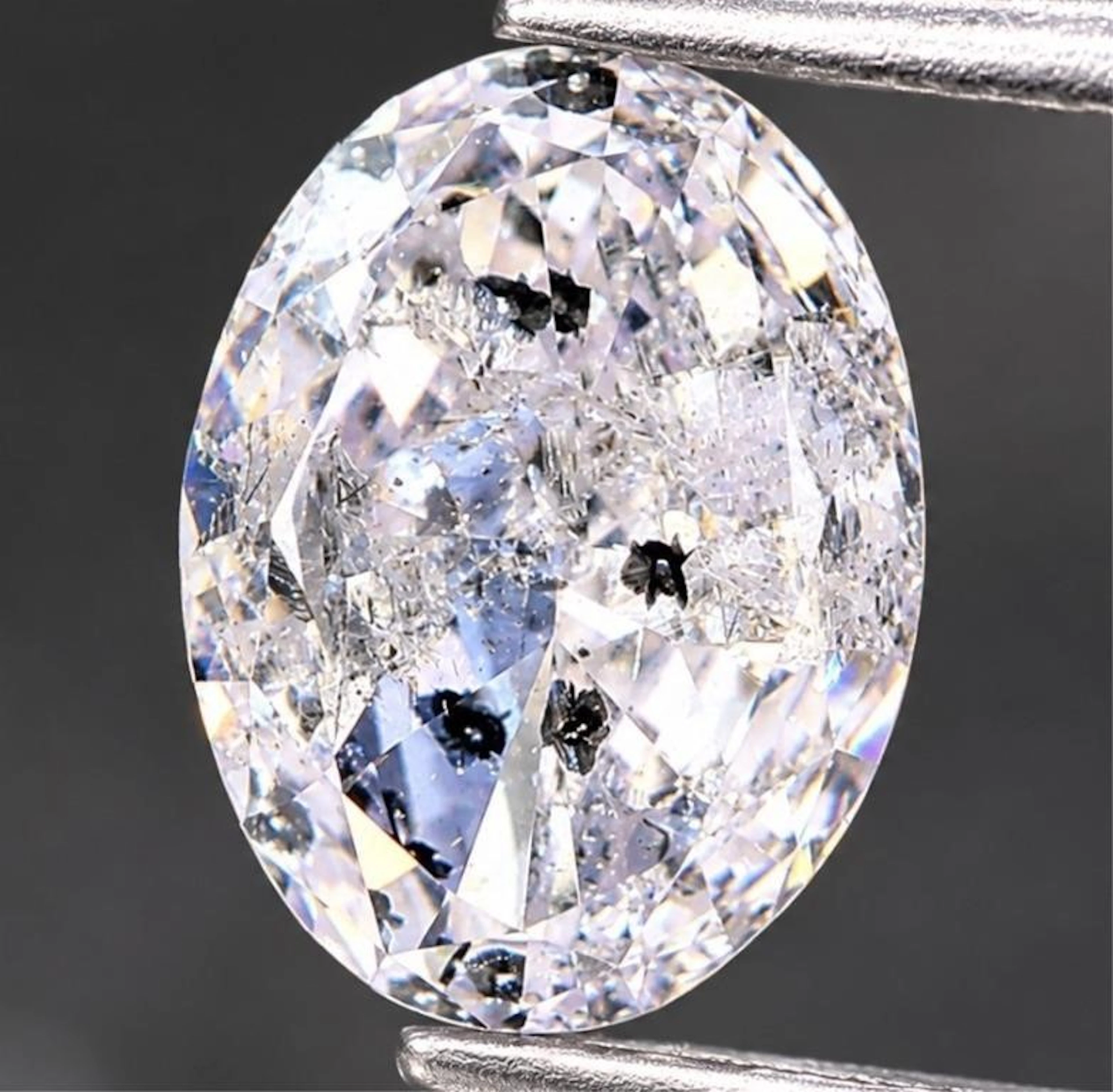 $56428* GIA Certified, natural diamond 0.91ct.Ova