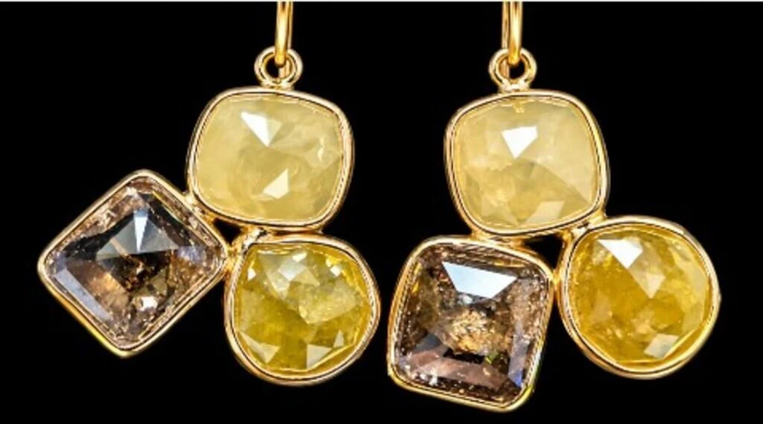 $0, 10k(1.7g), diamond (5.6ct)earring, retail valu