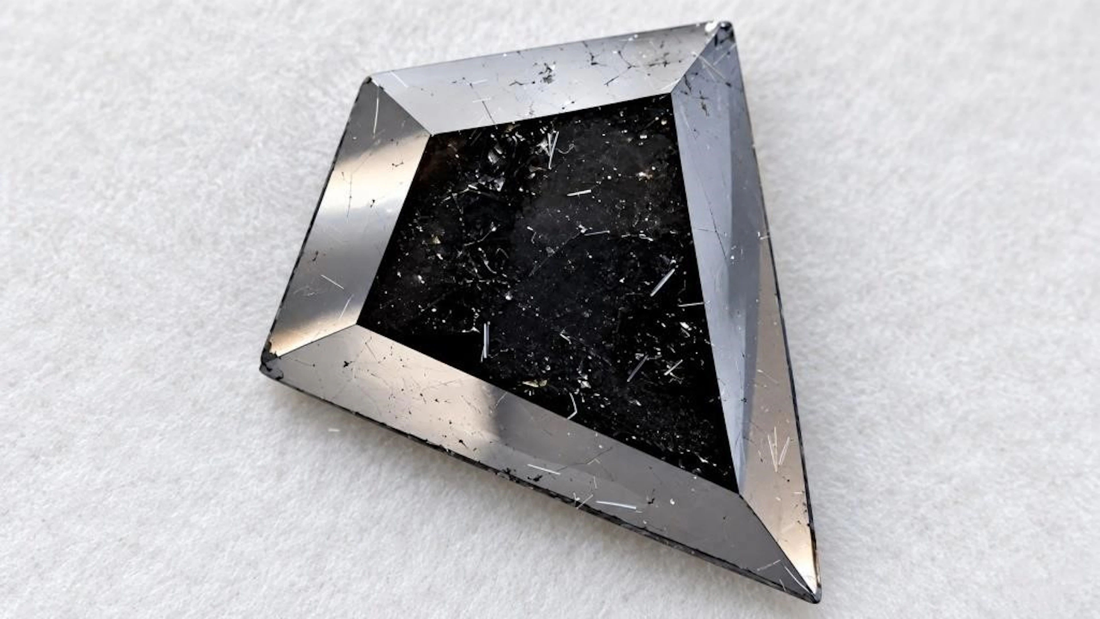 $3200, black diamond (8.3ct)gemstone, retail value