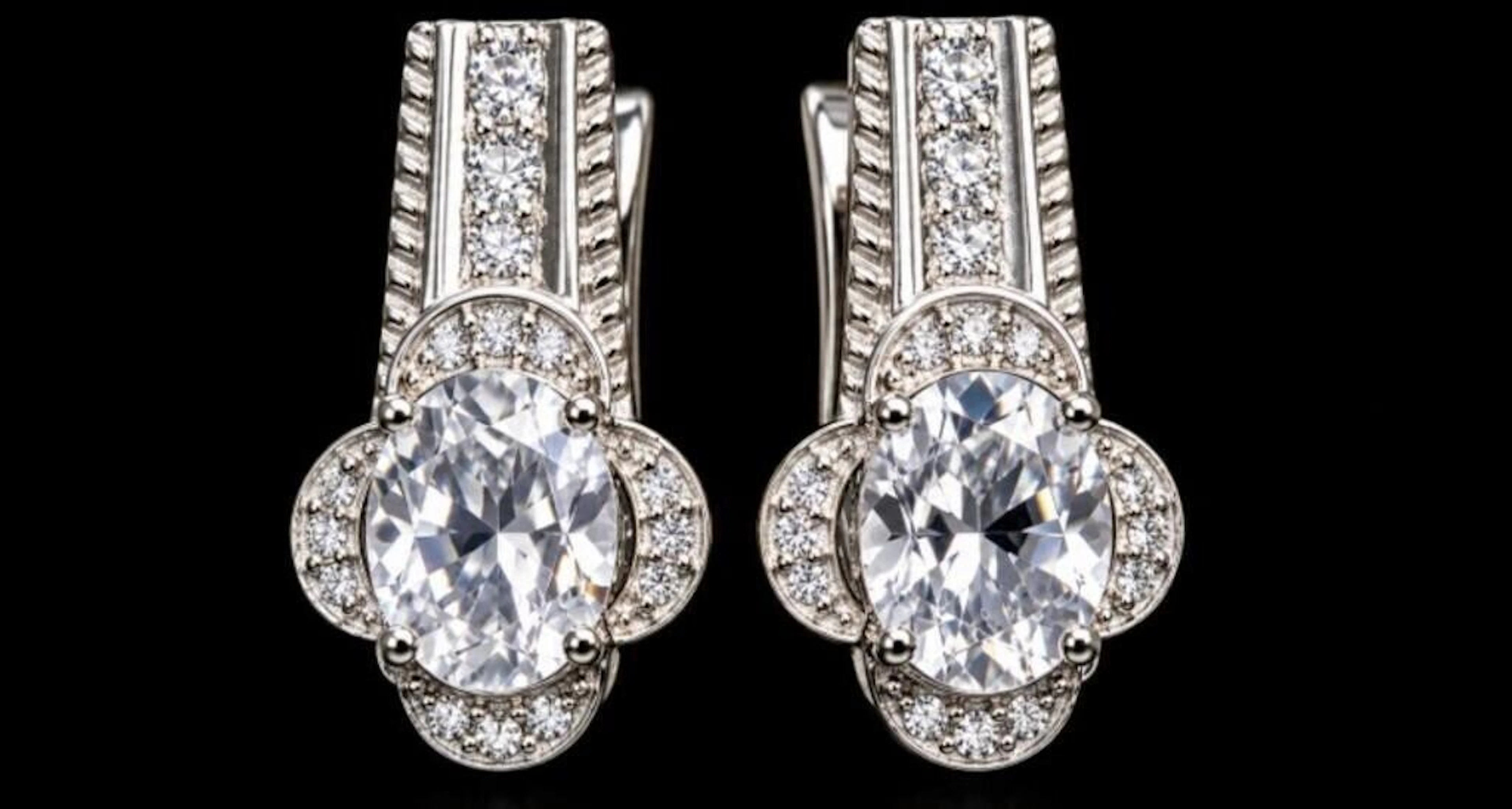 $340, silver (4.85g), white topaz (3ct)earring, re