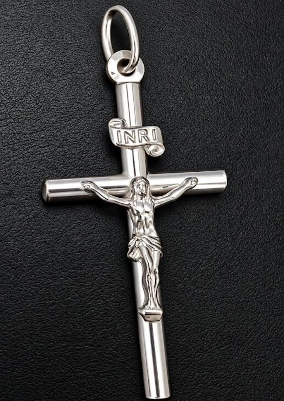 $60, silver(2.1g), cross pendant, retail value $6