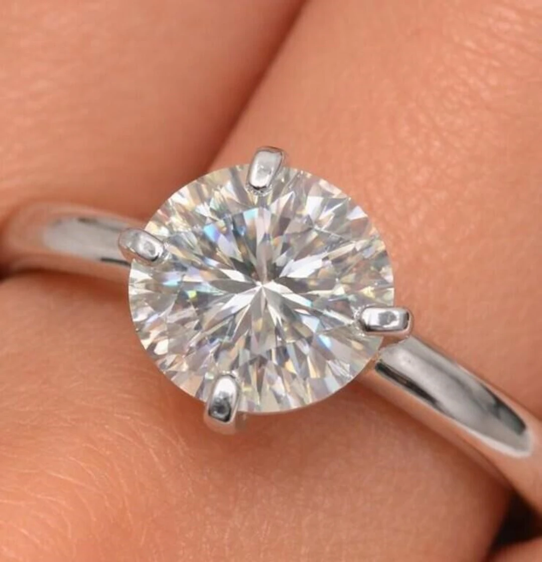 $1420, 10K(1.12g), Moissanite (0.83ct)Ring, size 8