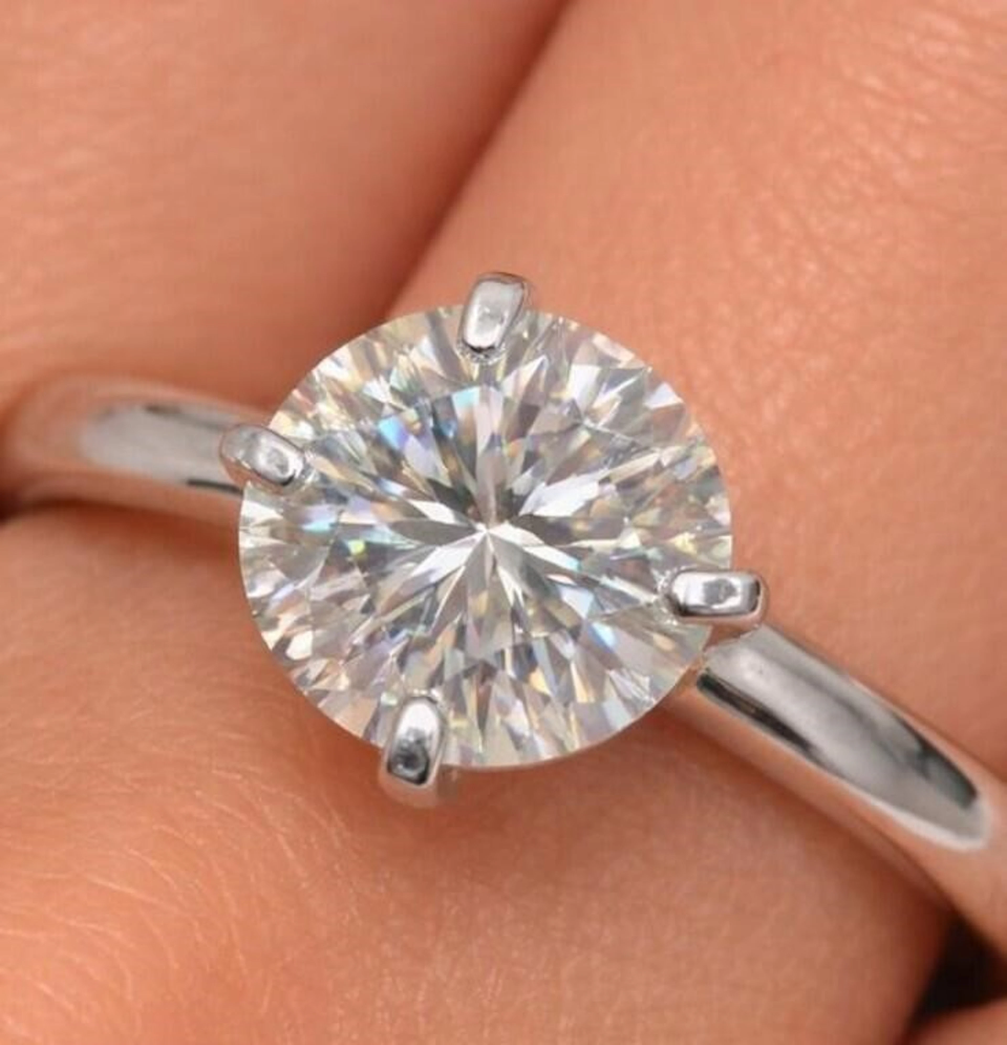 $1420, 10K(1.12g), Moissanite (0.83ct)Ring, size 8