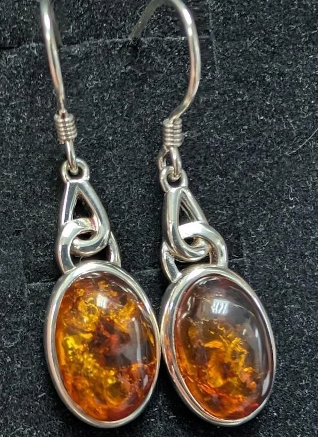 $220, silver(3.57g), amber earring, retail value