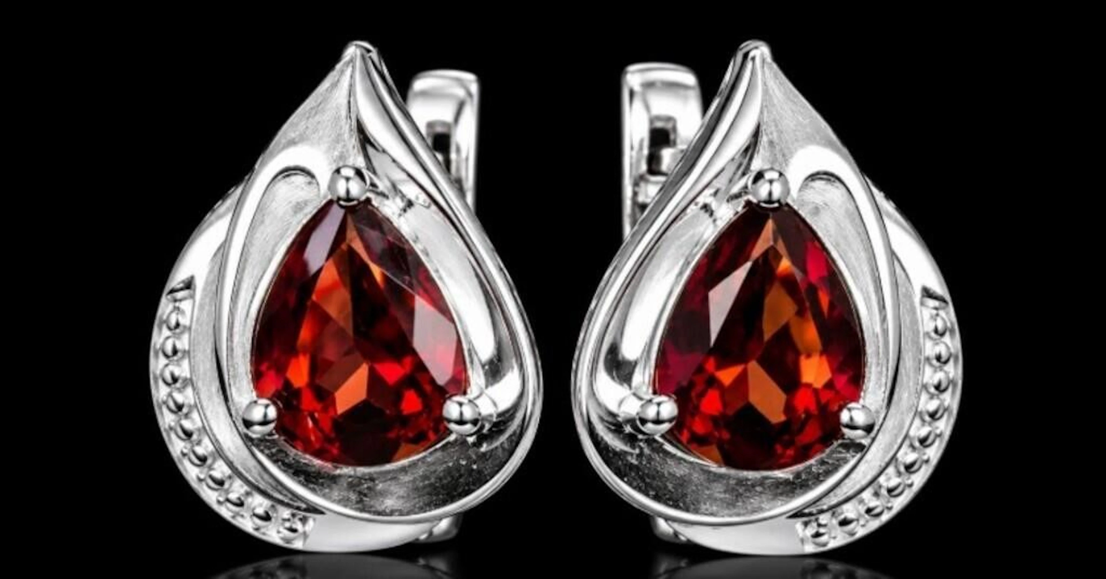 $280, silver(4.01g), garnet (2ct)earing, retail va