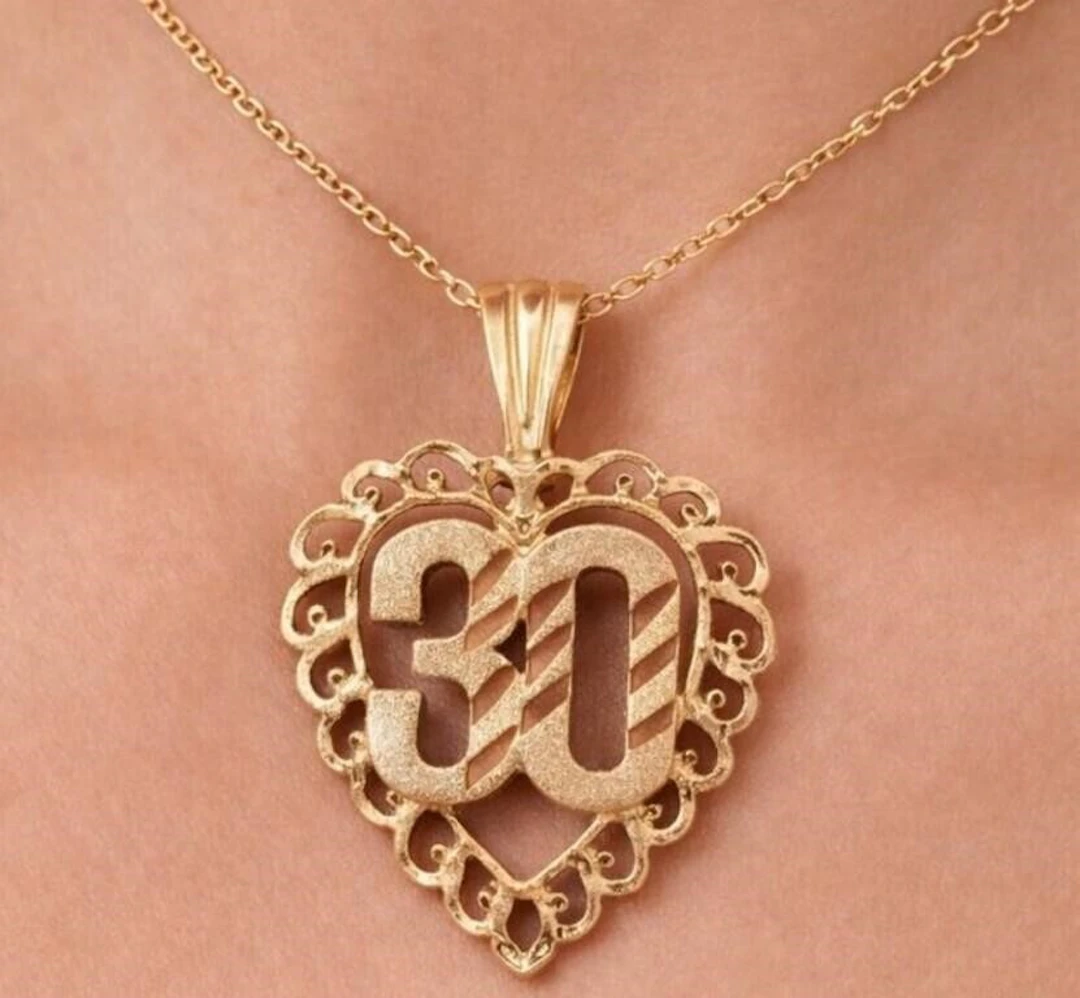 $900, 10K(0.94g), Pendant, appraised/retail value