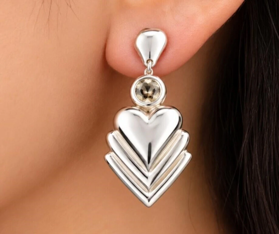 $100, silver(2.65g), czearring, retail value $100