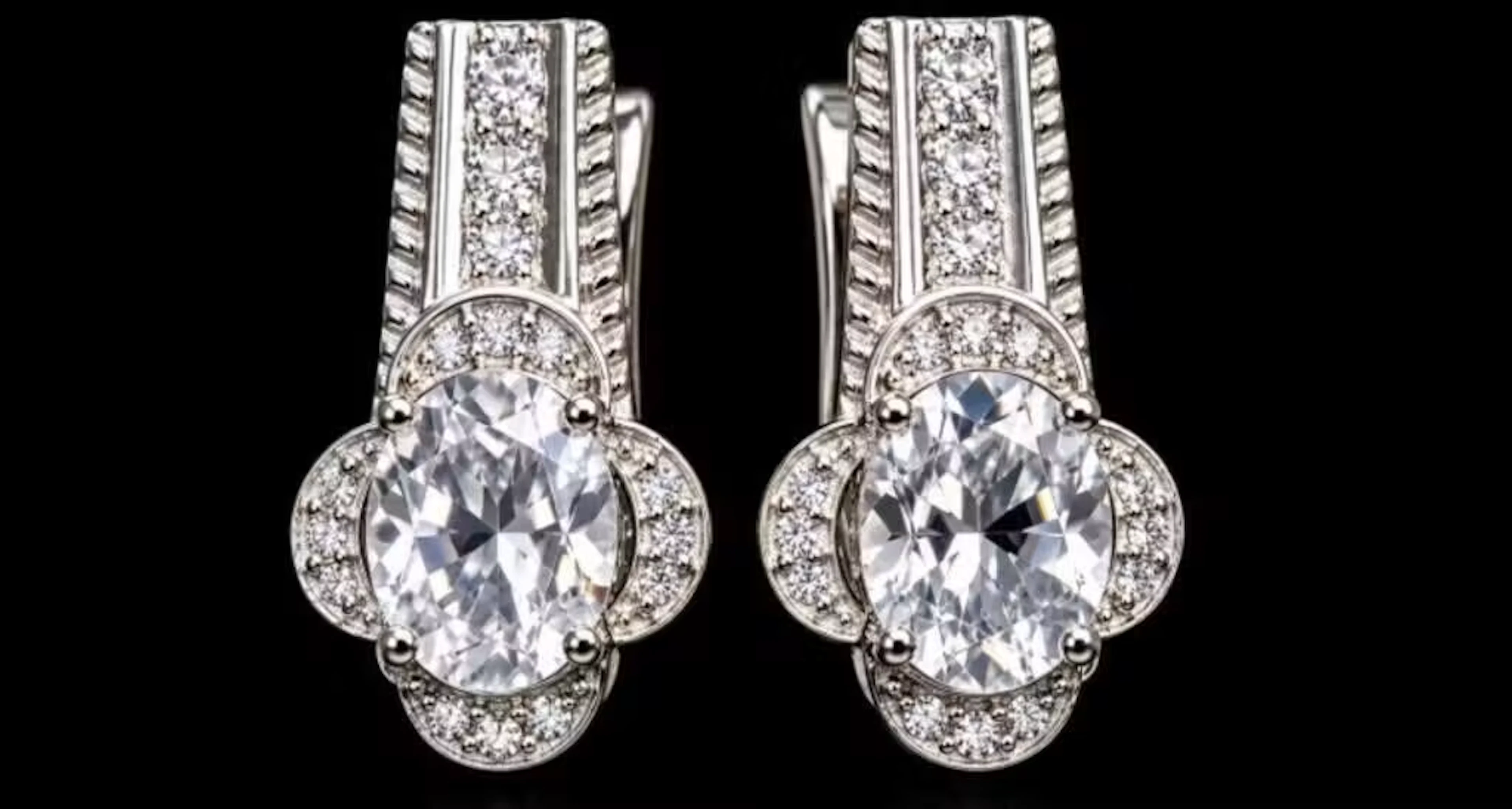 $340, silver (4.85g), white topaz (3ct)earring, re