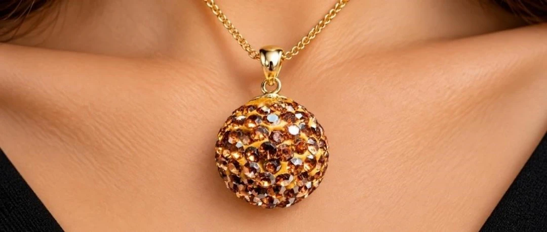$60, (2g), crystal ballpendant, retail value $60