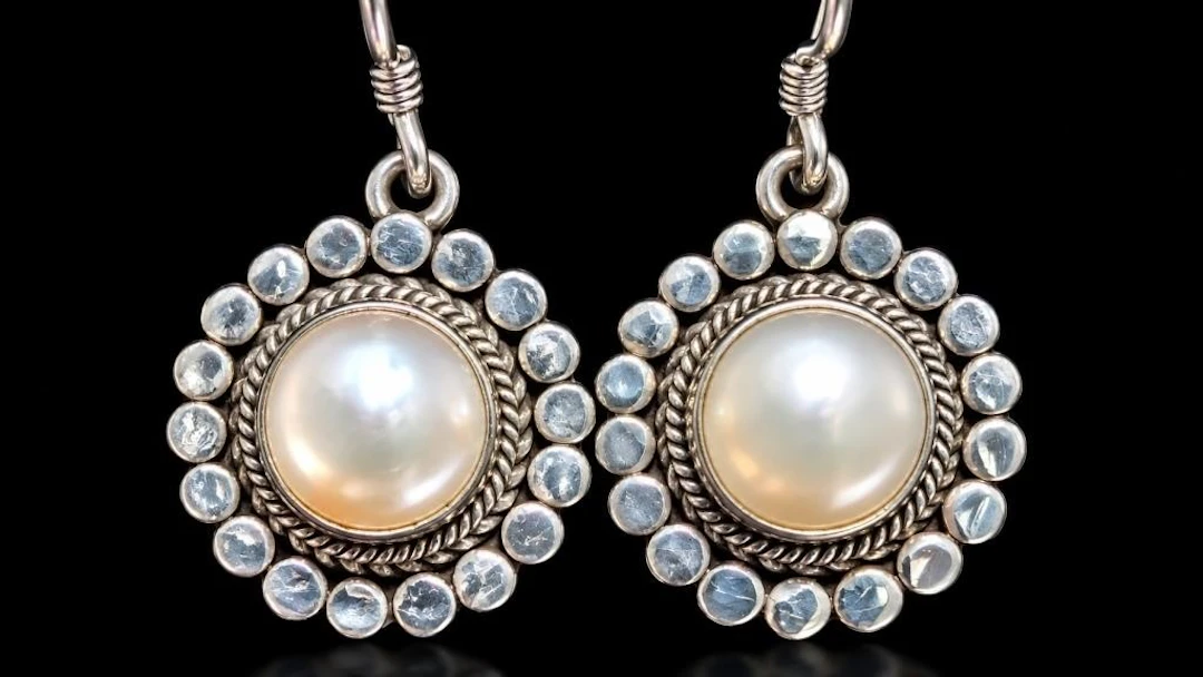 $400, silver(6.7g), pearlpendant, retail value $40