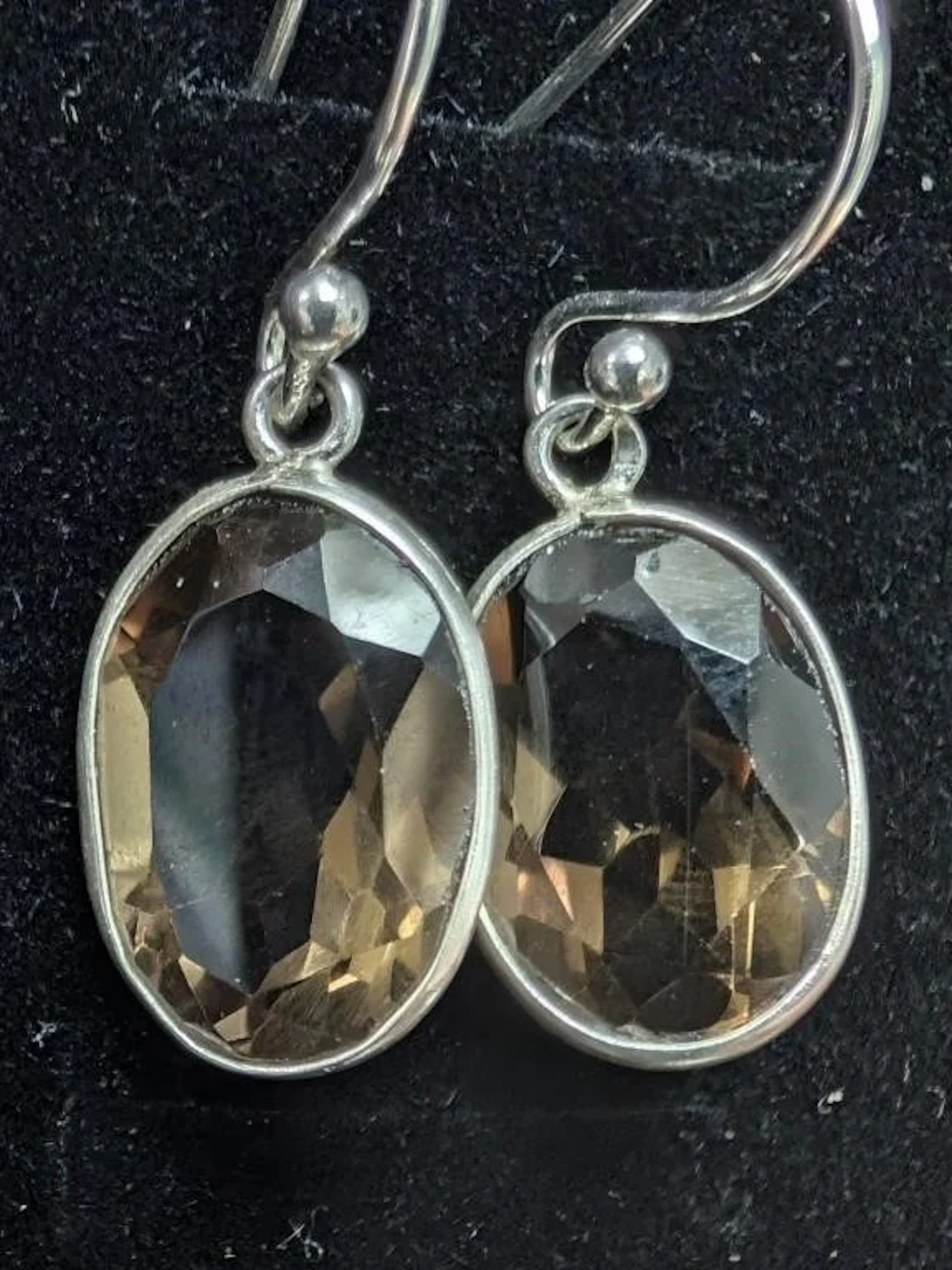 $180, silver(3.3g), smokey quartz (12ct)earing, re