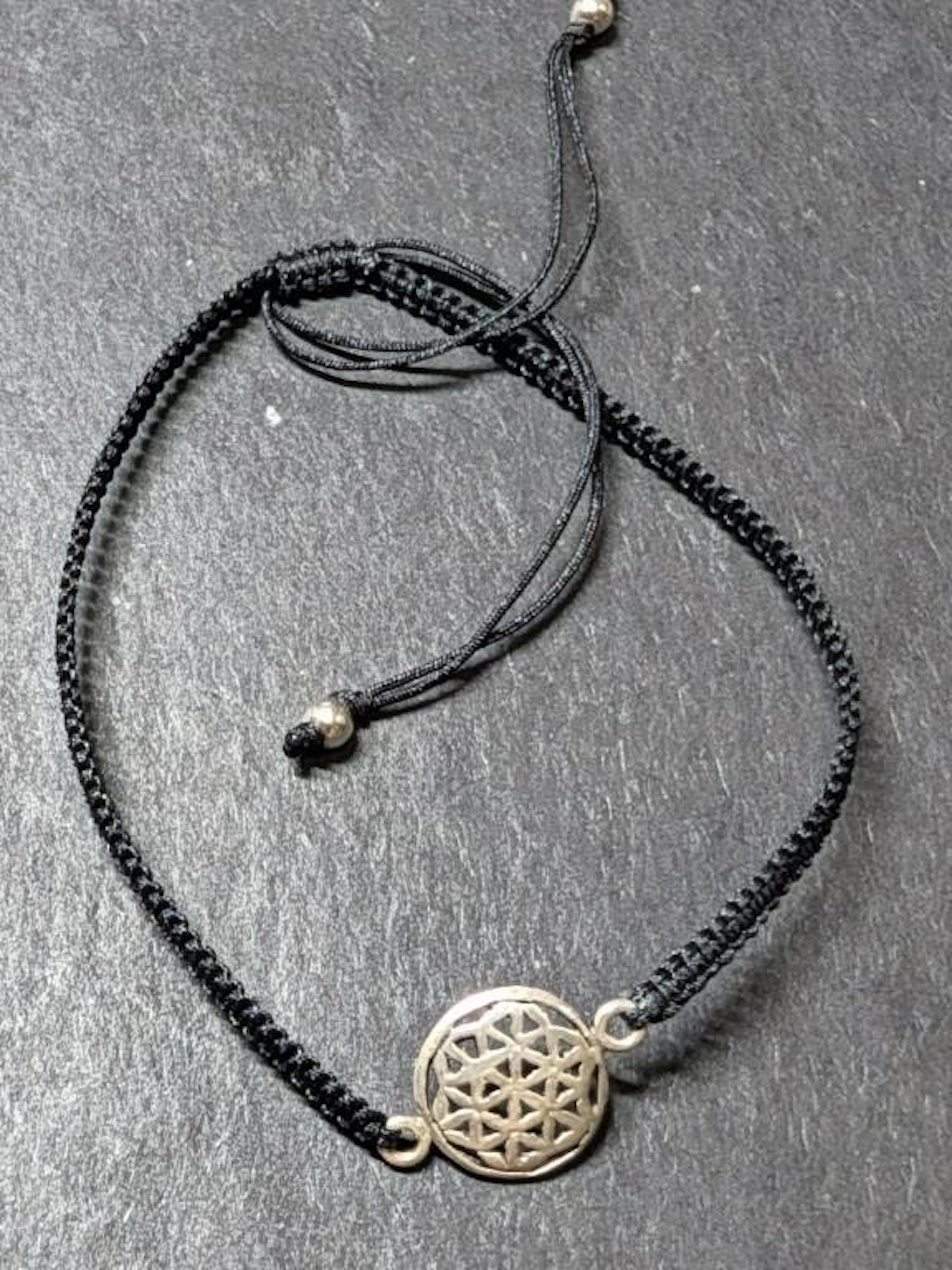 $20, bracelet, appraised/retail value $20